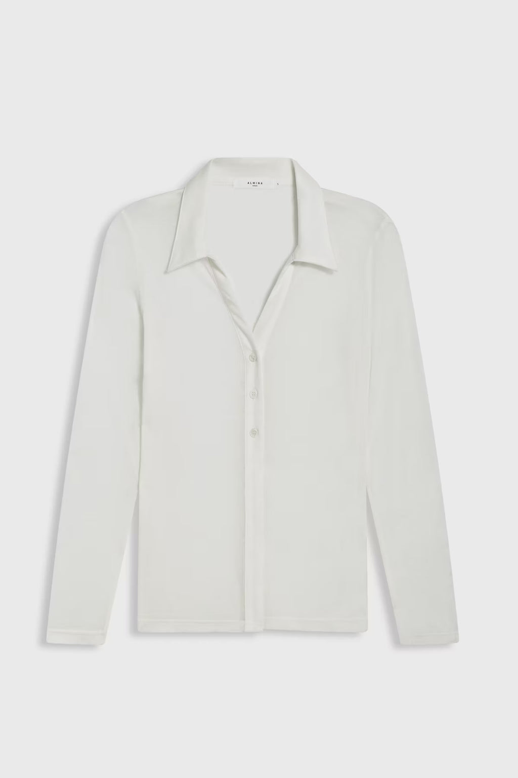 Sheer white top on a white background
