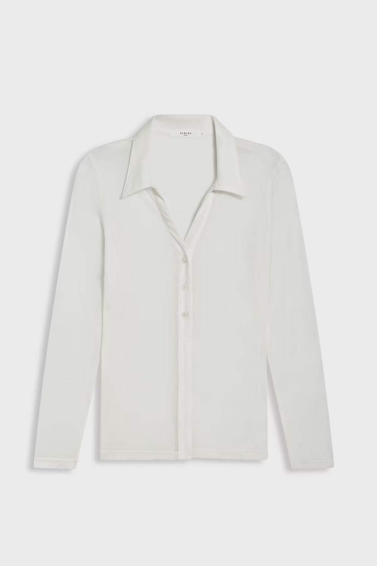 Sheer white top on a white background