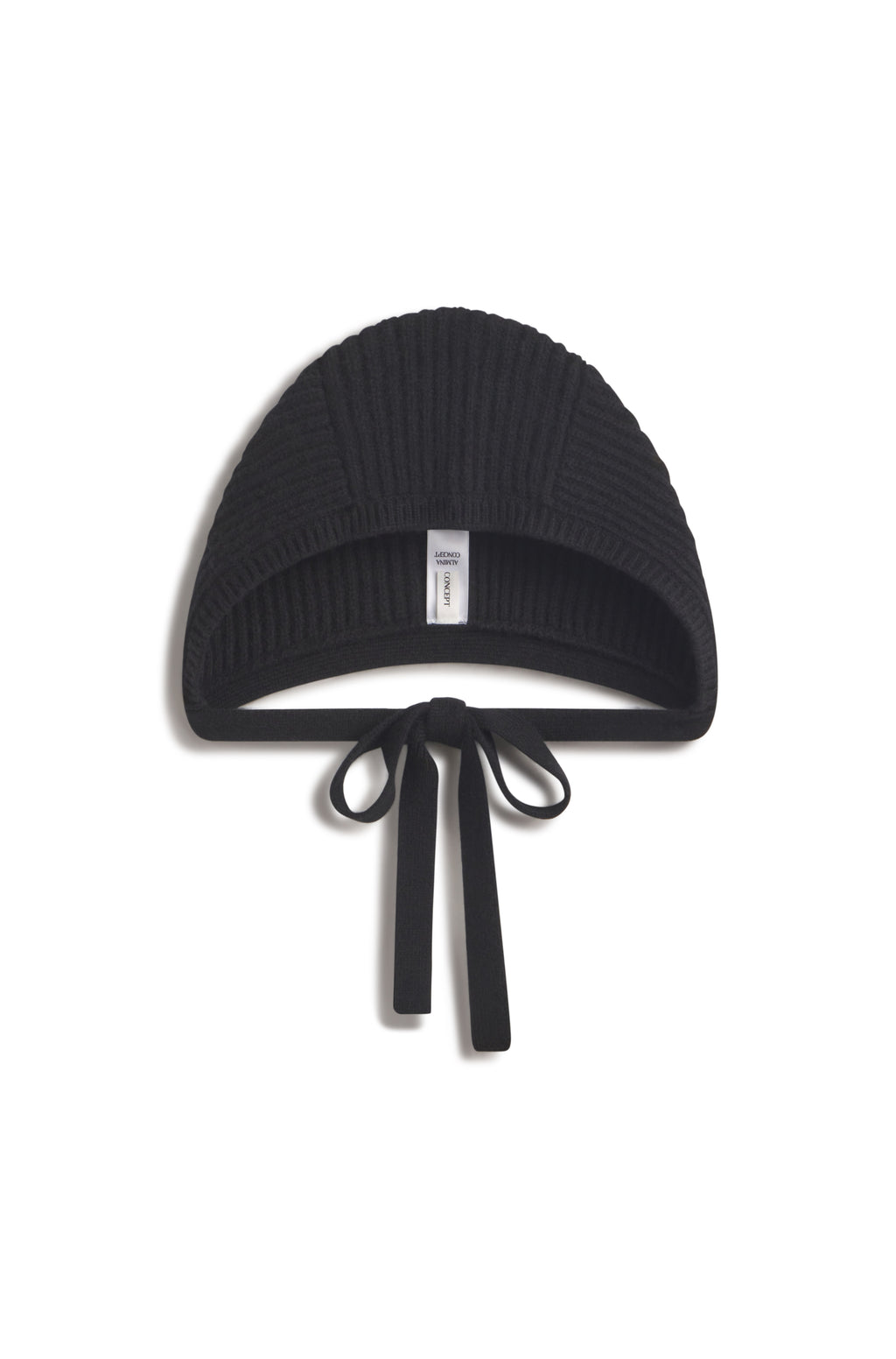 Black knit hat against a white background