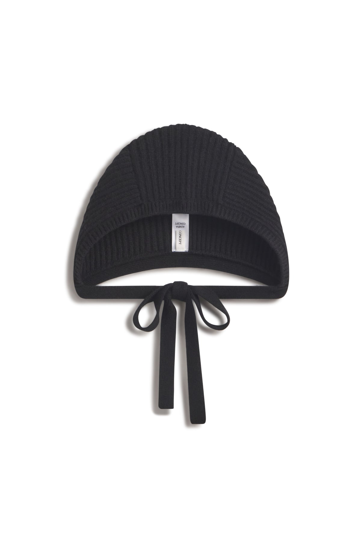 Black knit hat against a white background