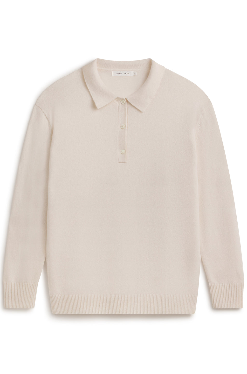White polo knit sweater with button up front on a white background