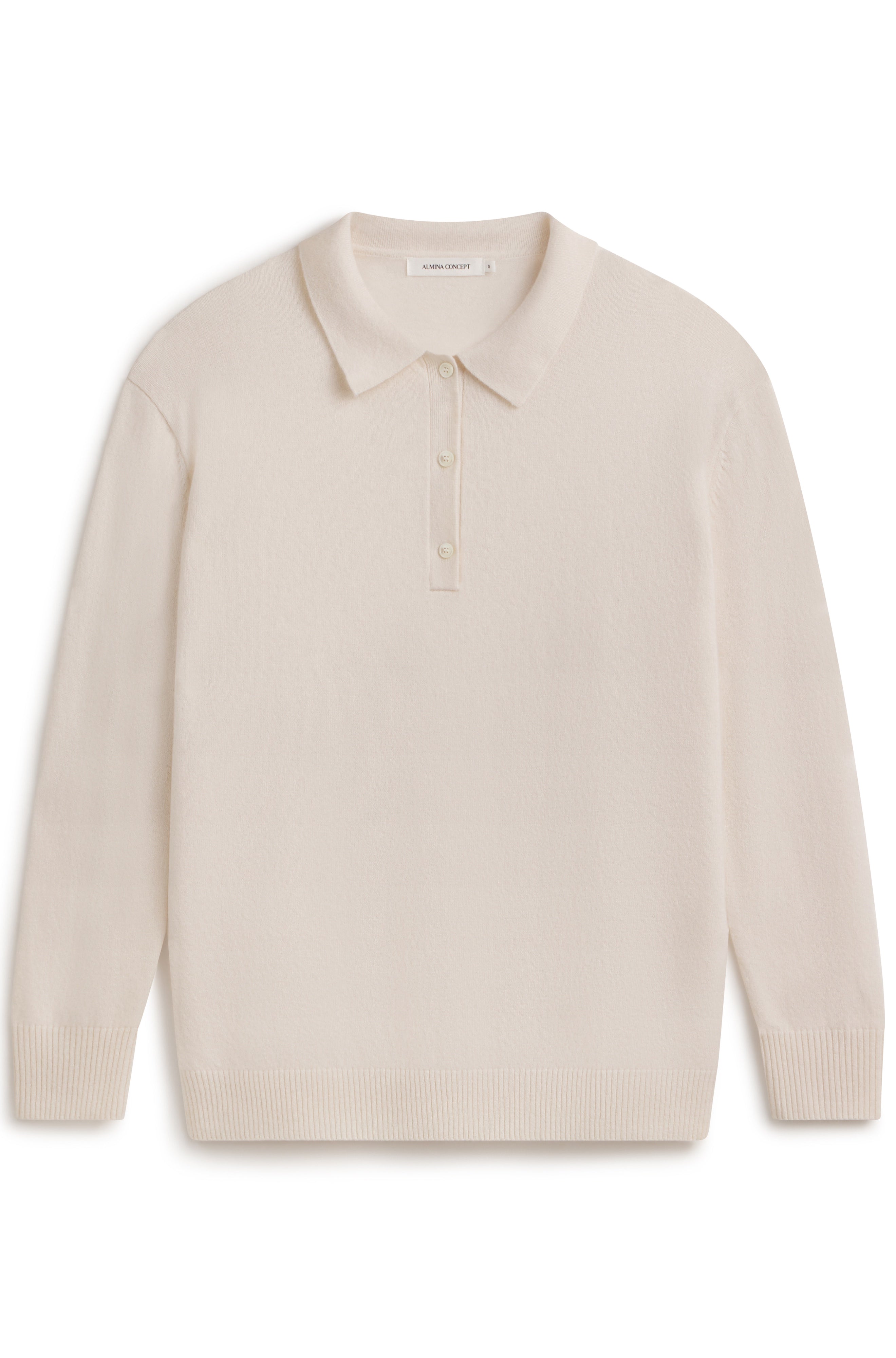 White polo knit sweater with button up front on a white background