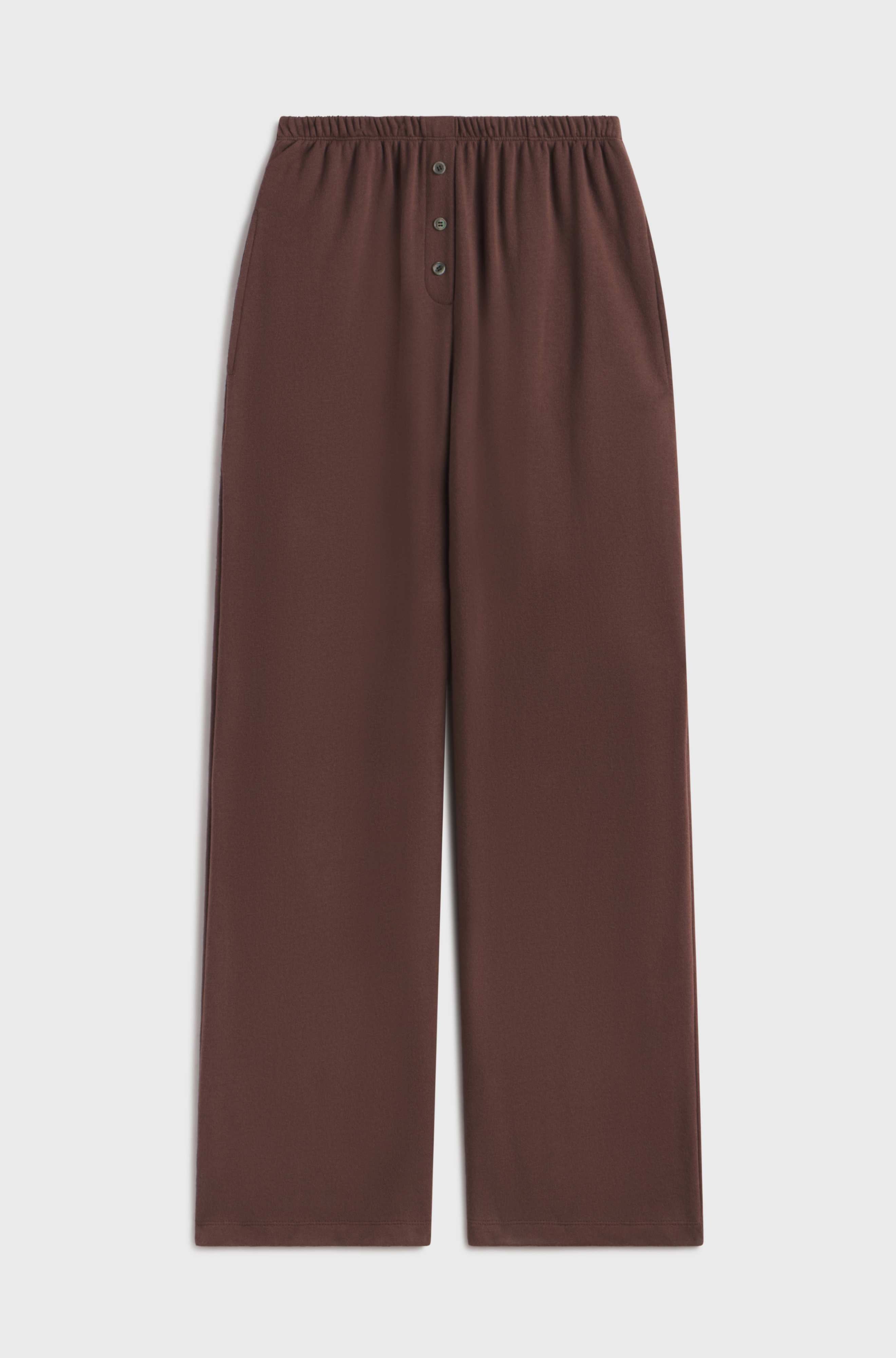 Brown pants with button fly on a white background