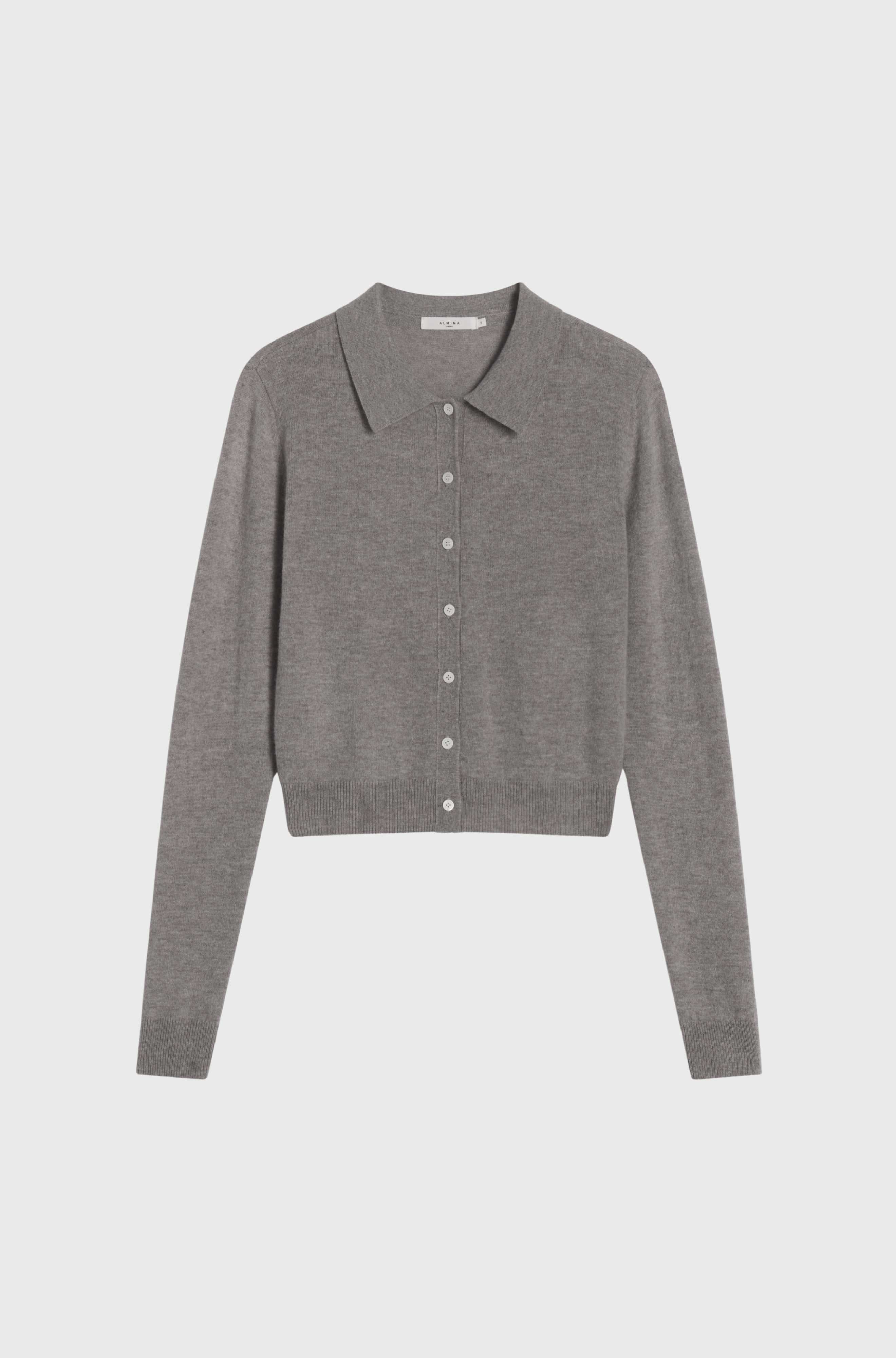 Gray button-up shirt on a light gray background