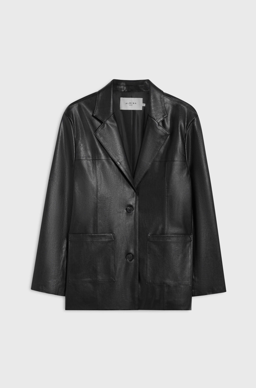 Black leather jacket on a light gray background