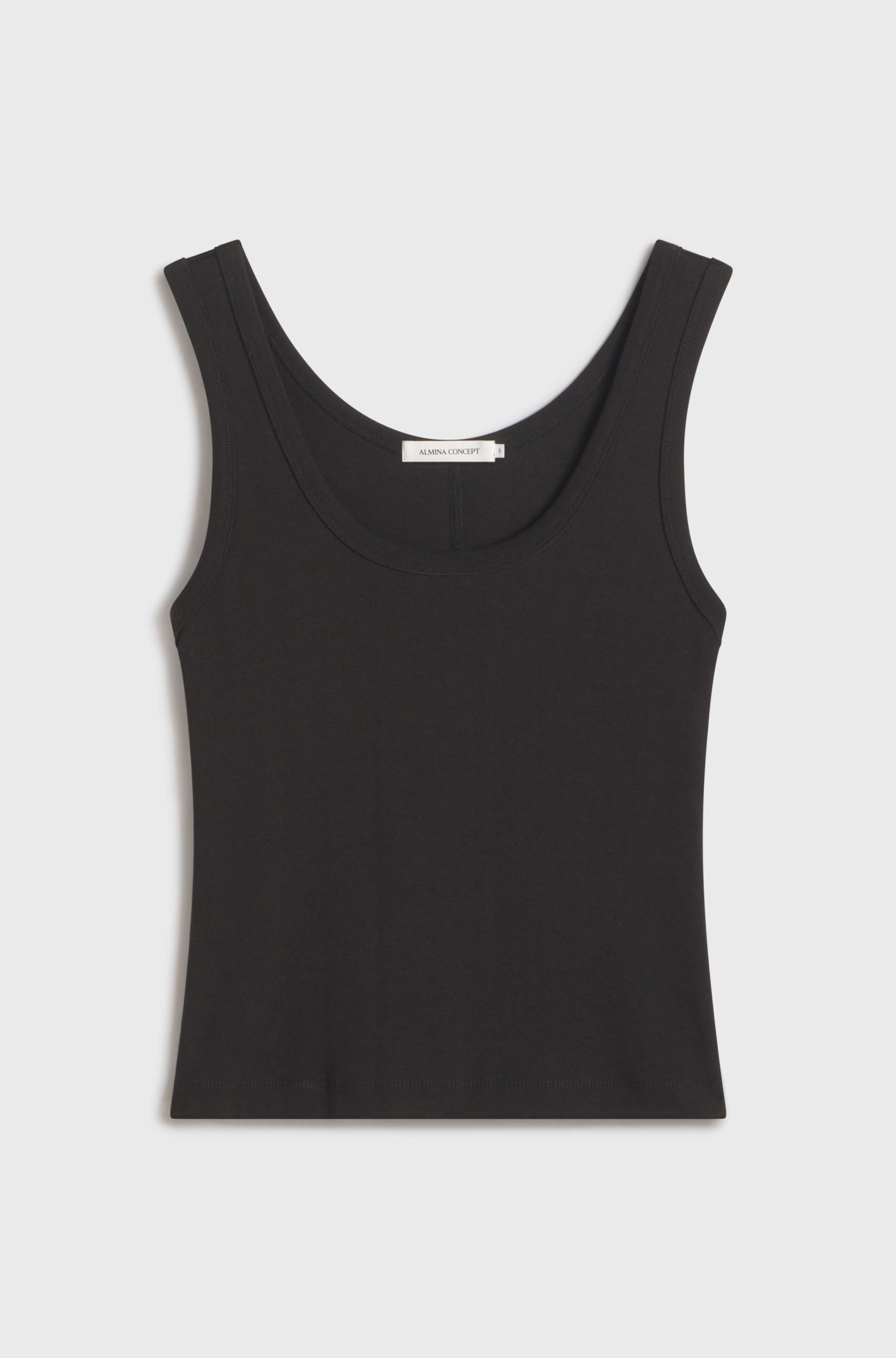 Black tank top on a light gray background