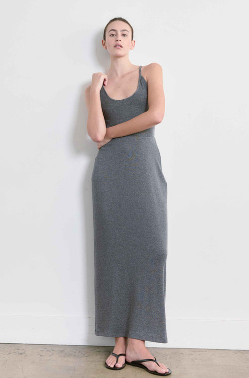 Gray tank and matching skirt worn by a person on a white background