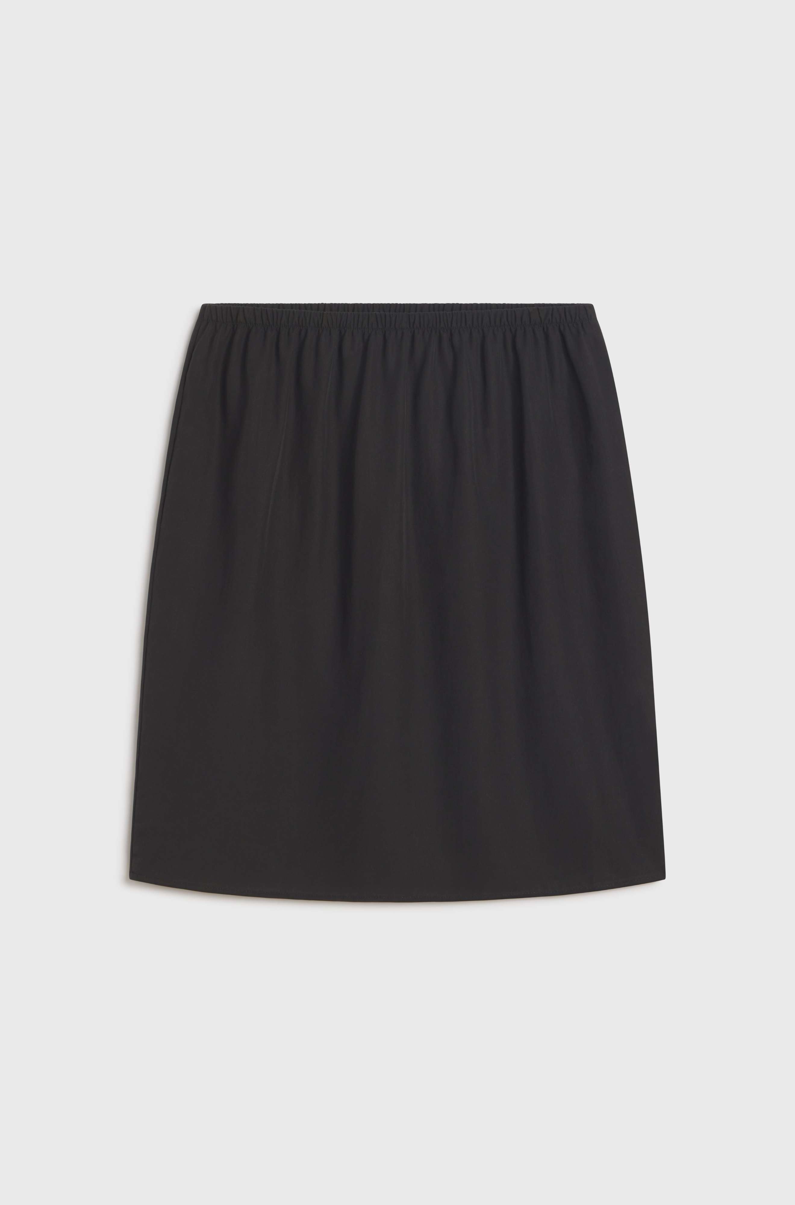 Black skirt on a light gray background