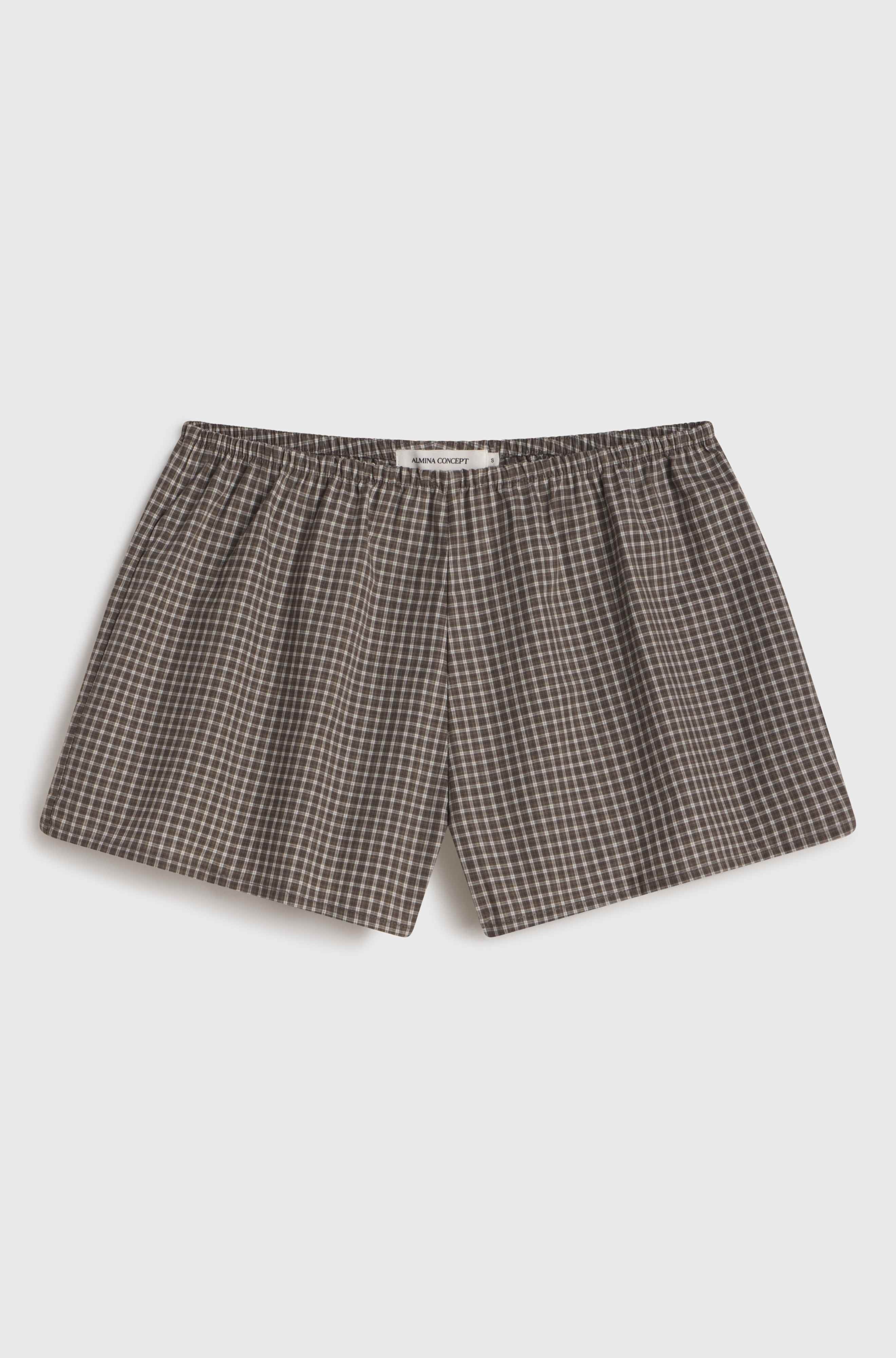 Plaid shorts on a white background