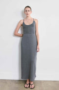 Woman wearing a grey skirt with a matching tank