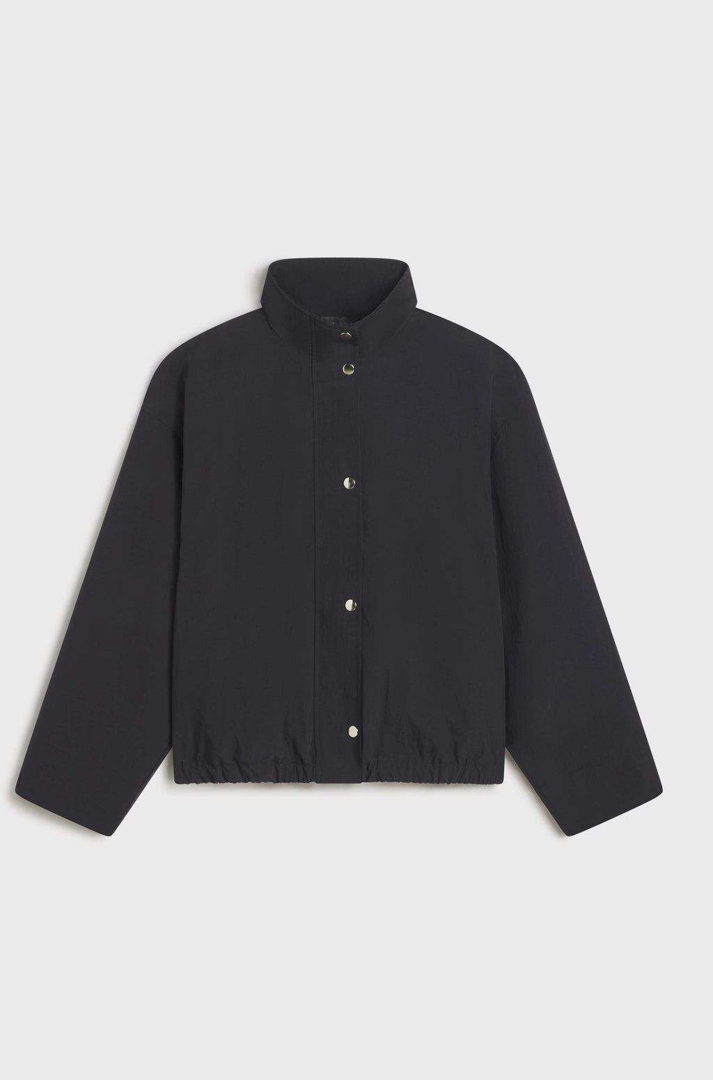 Black button up jacket on light grey background