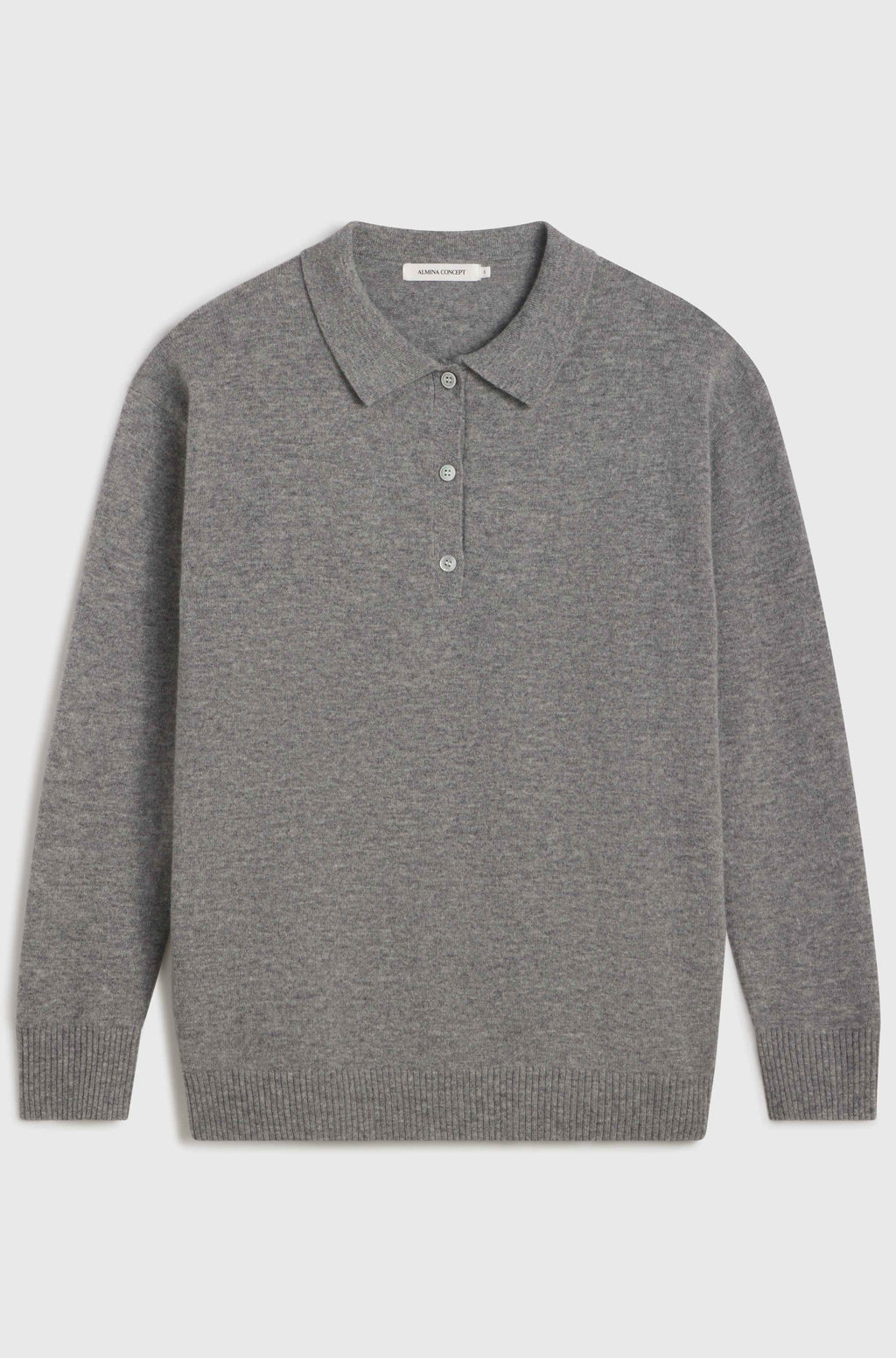 Grey polo wool sweater on light grey background