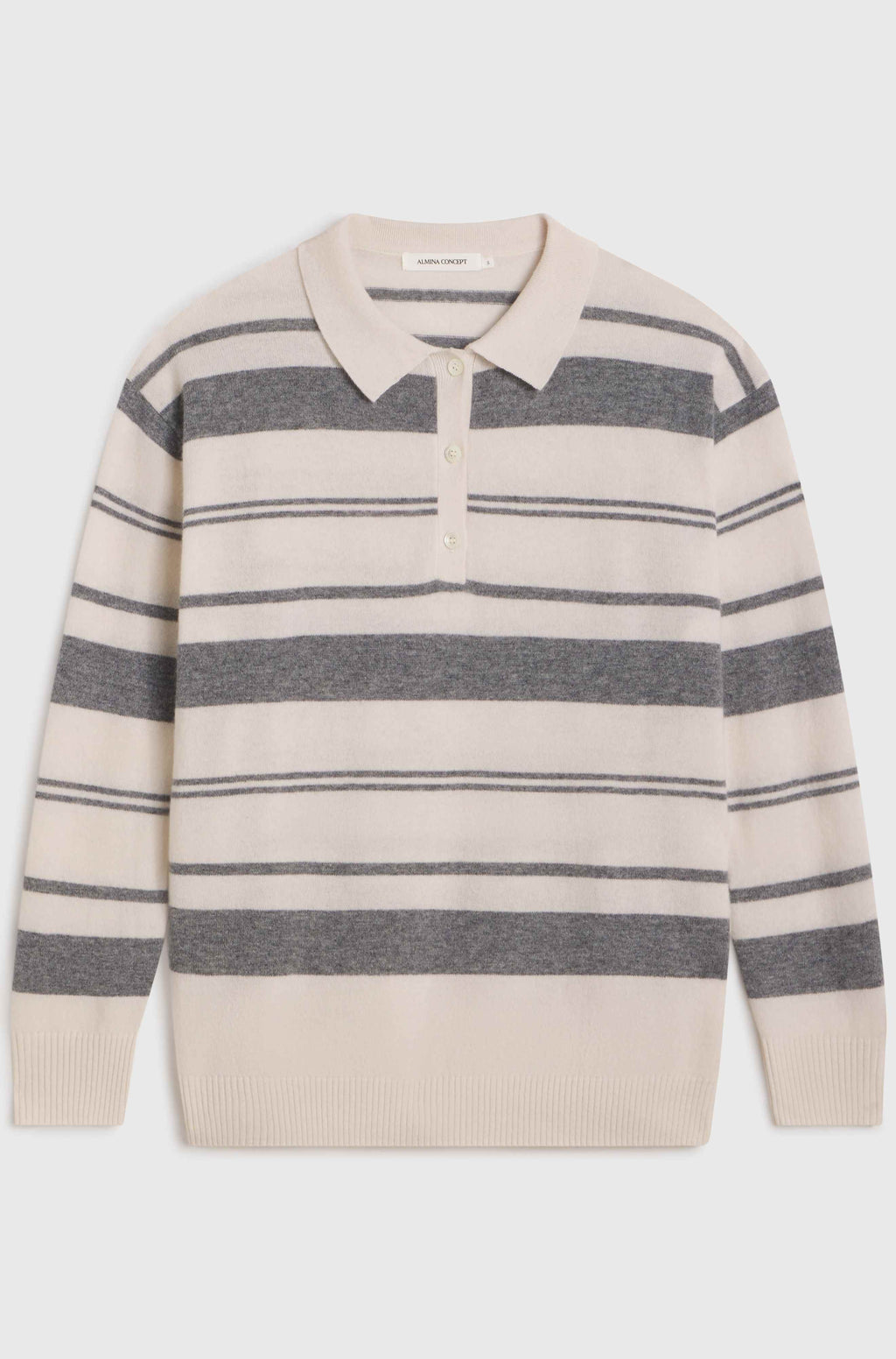 White and grey stripe wool sweater on light grey background