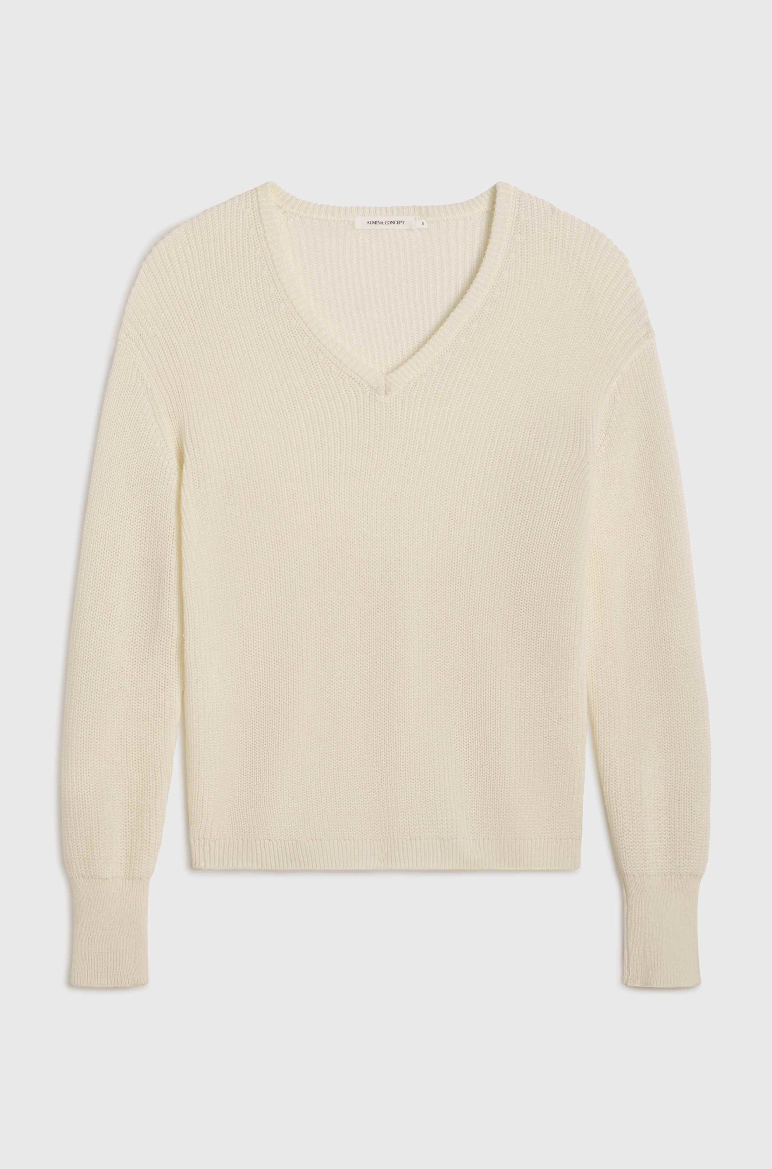 Mesh cotton white sweater on light grey background