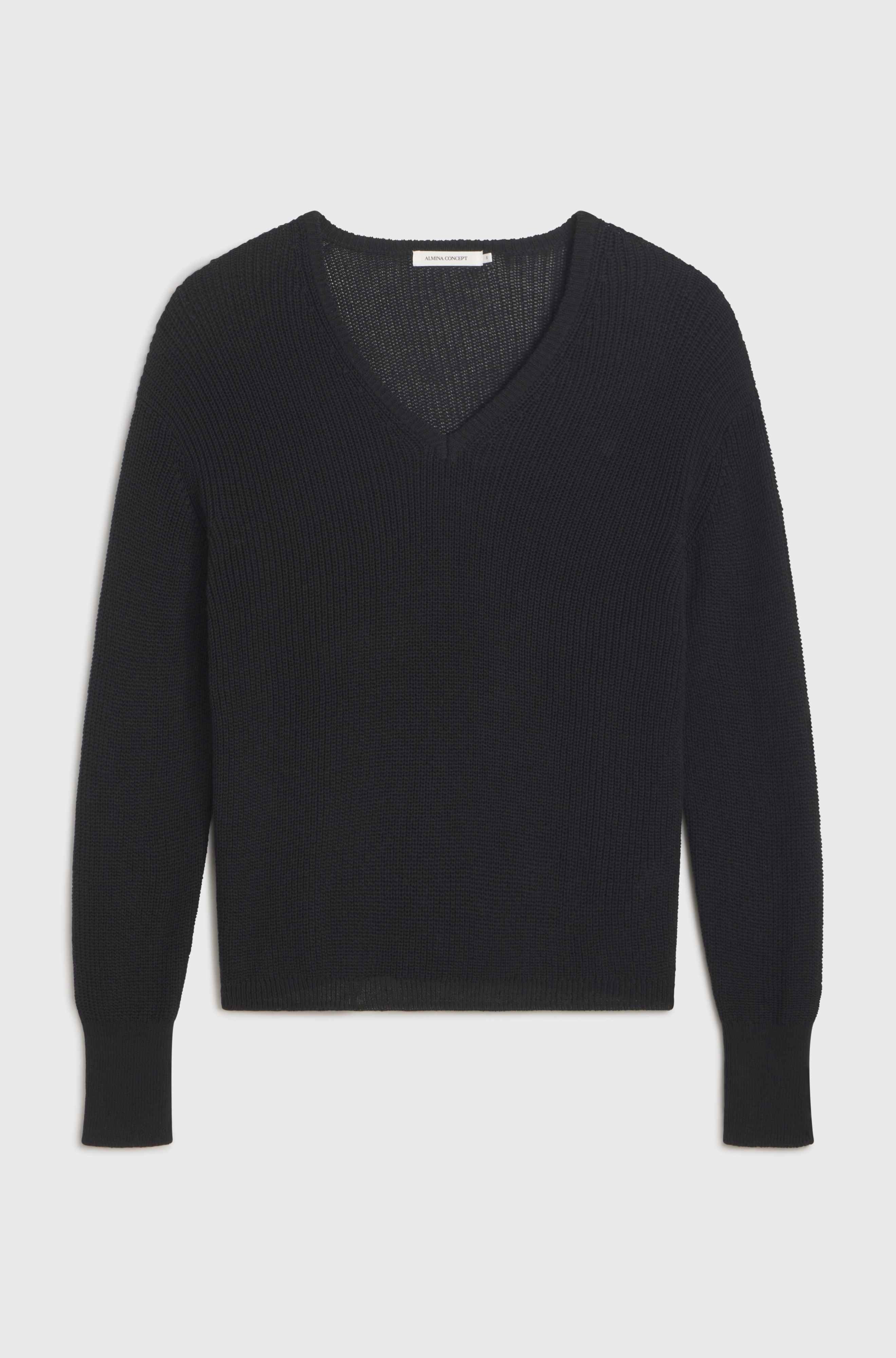 Mesh cotton black sweater on light grey background
