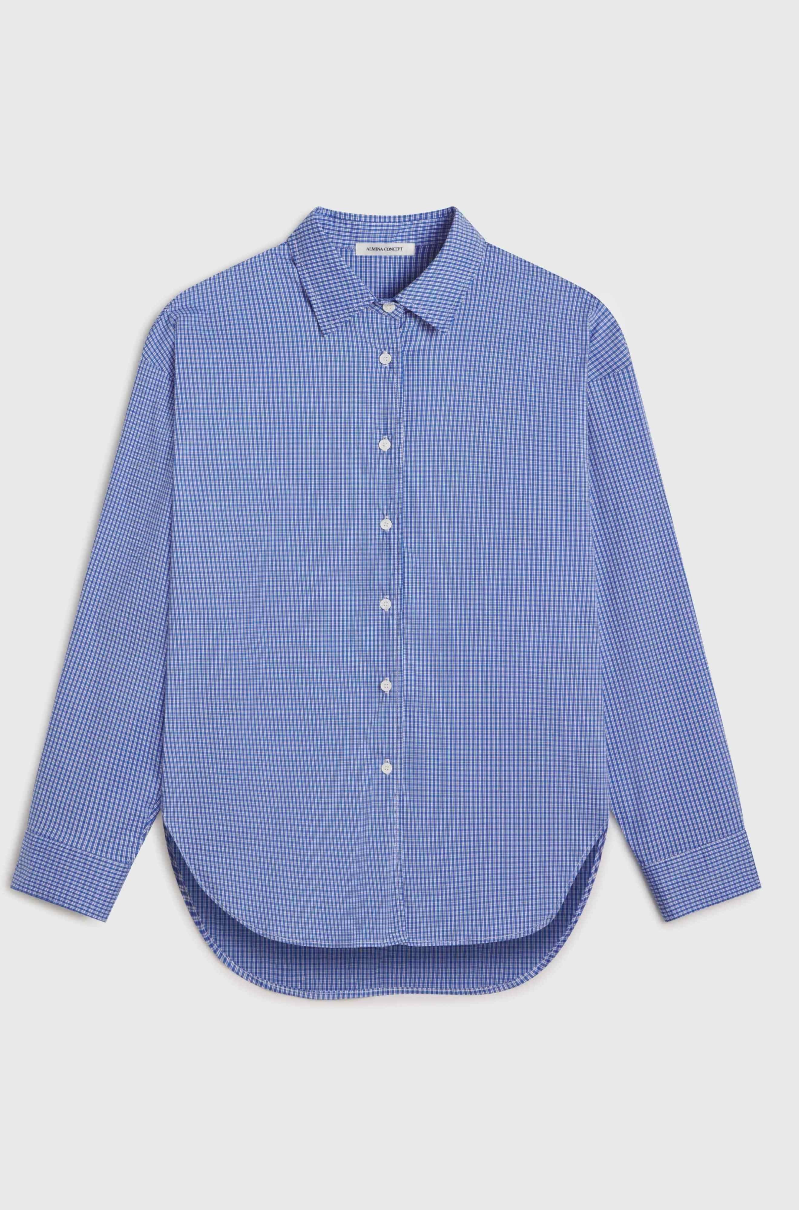 Blue checkered shirt on a light gray background