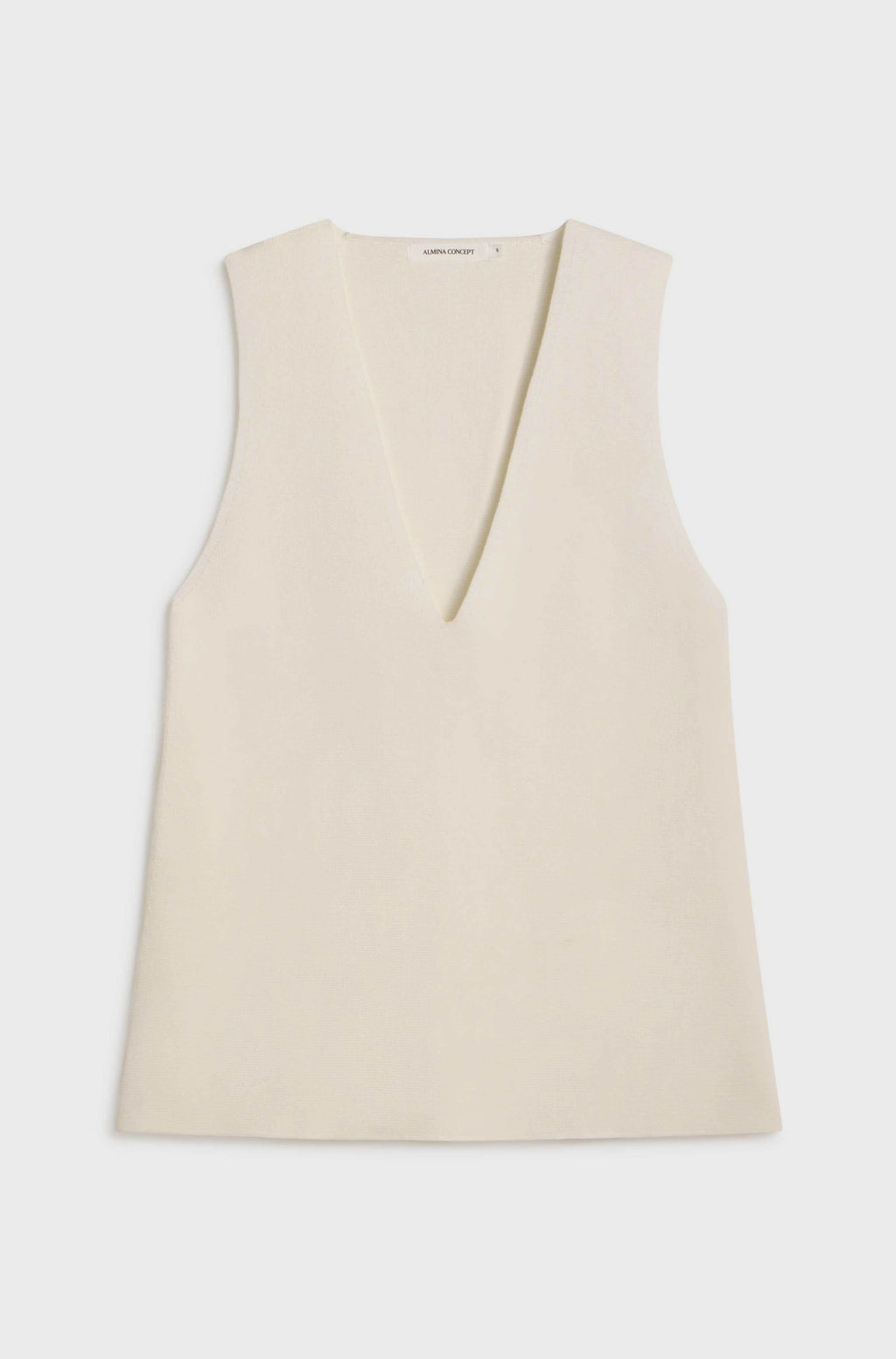 White sleeveless top on a white background