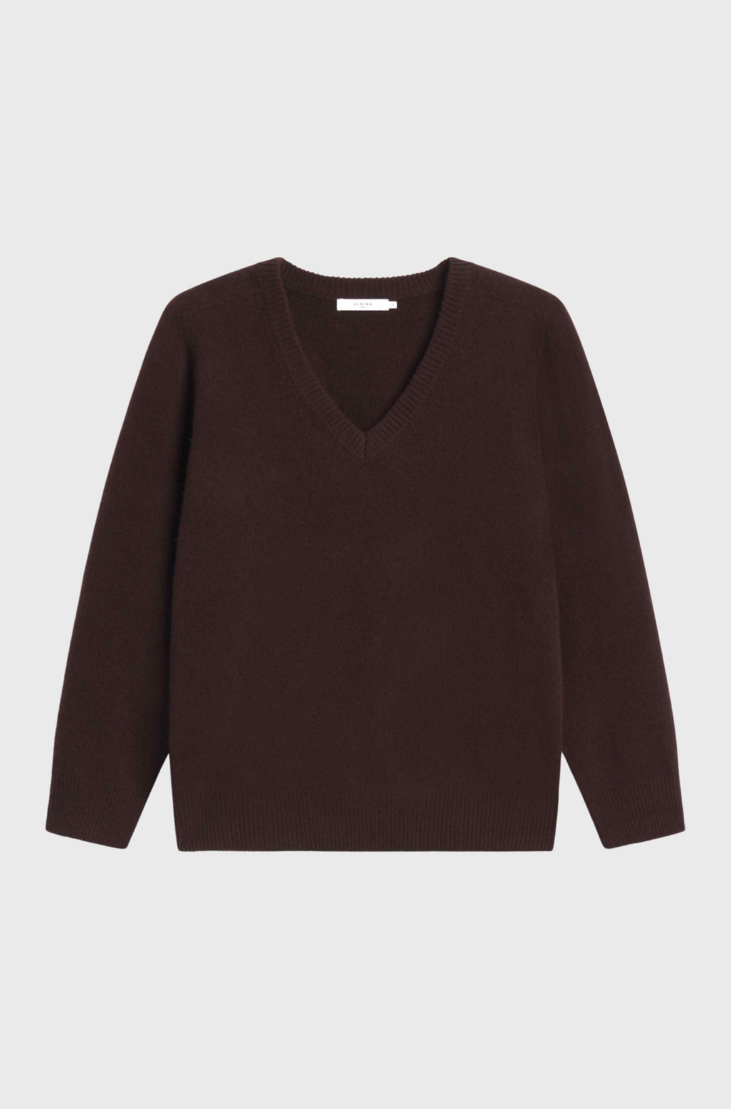 Brown sweater on a light gray background