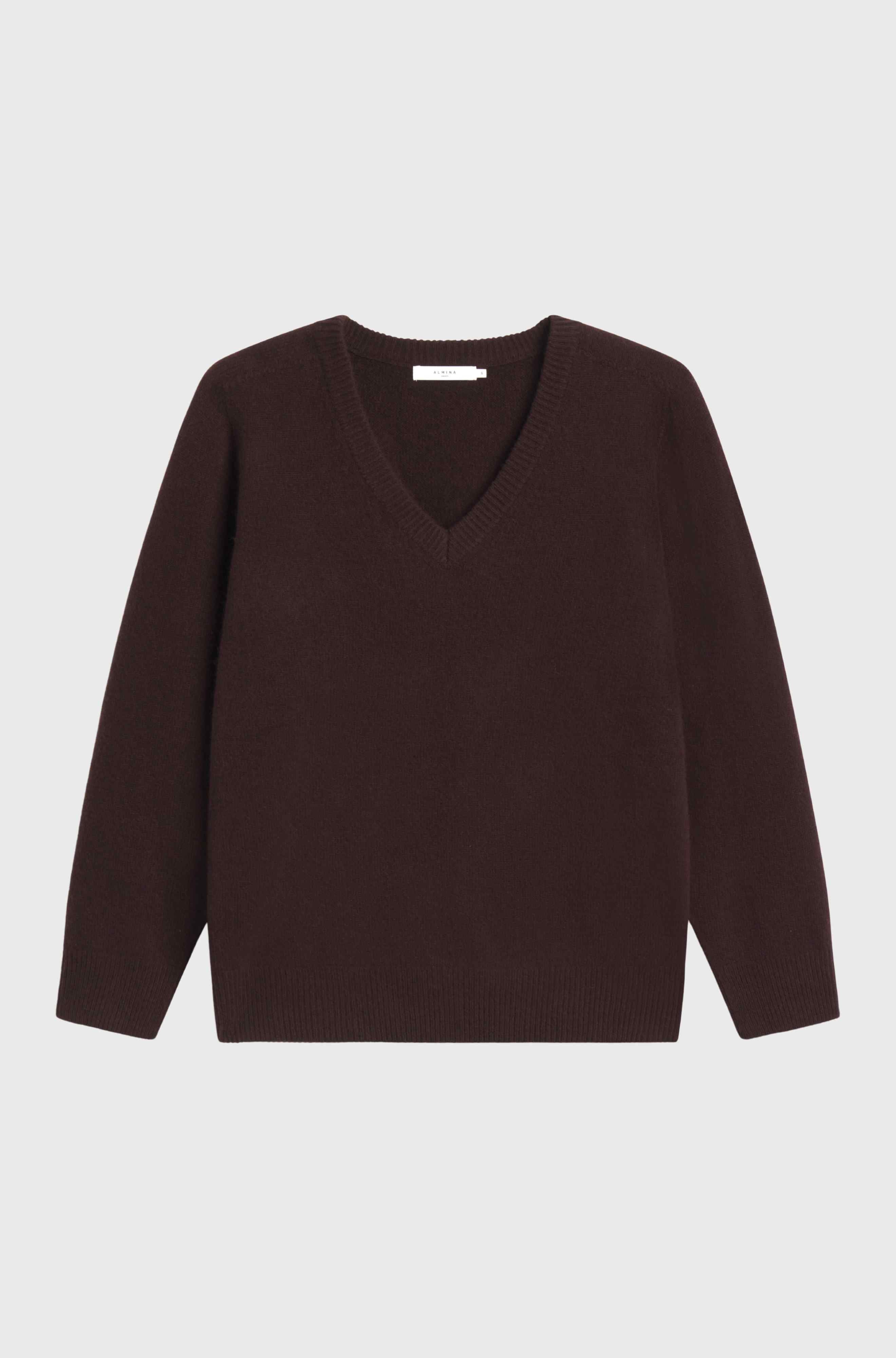 Brown sweater on a light gray background