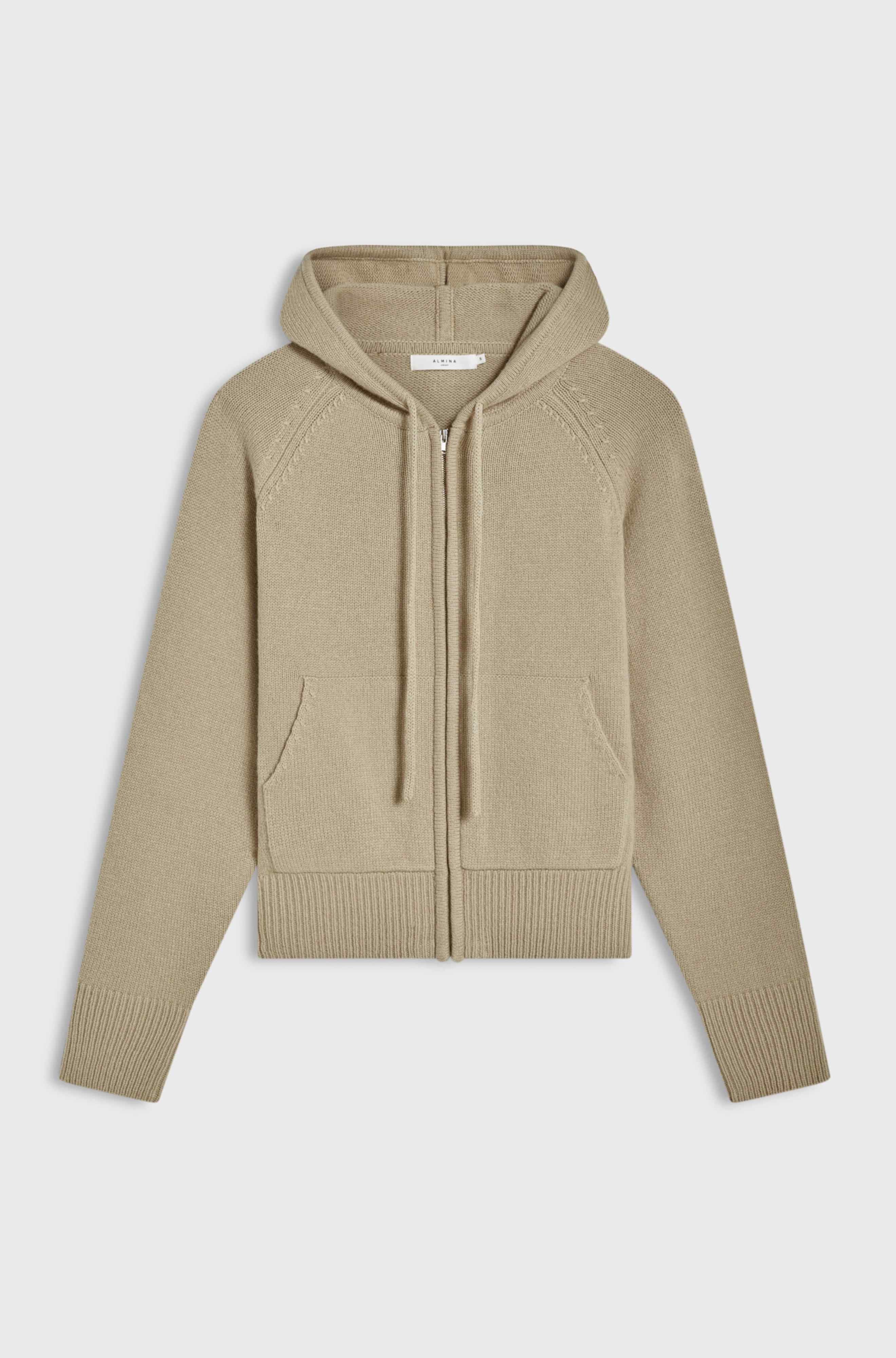 Beige hoodie on a light gray background