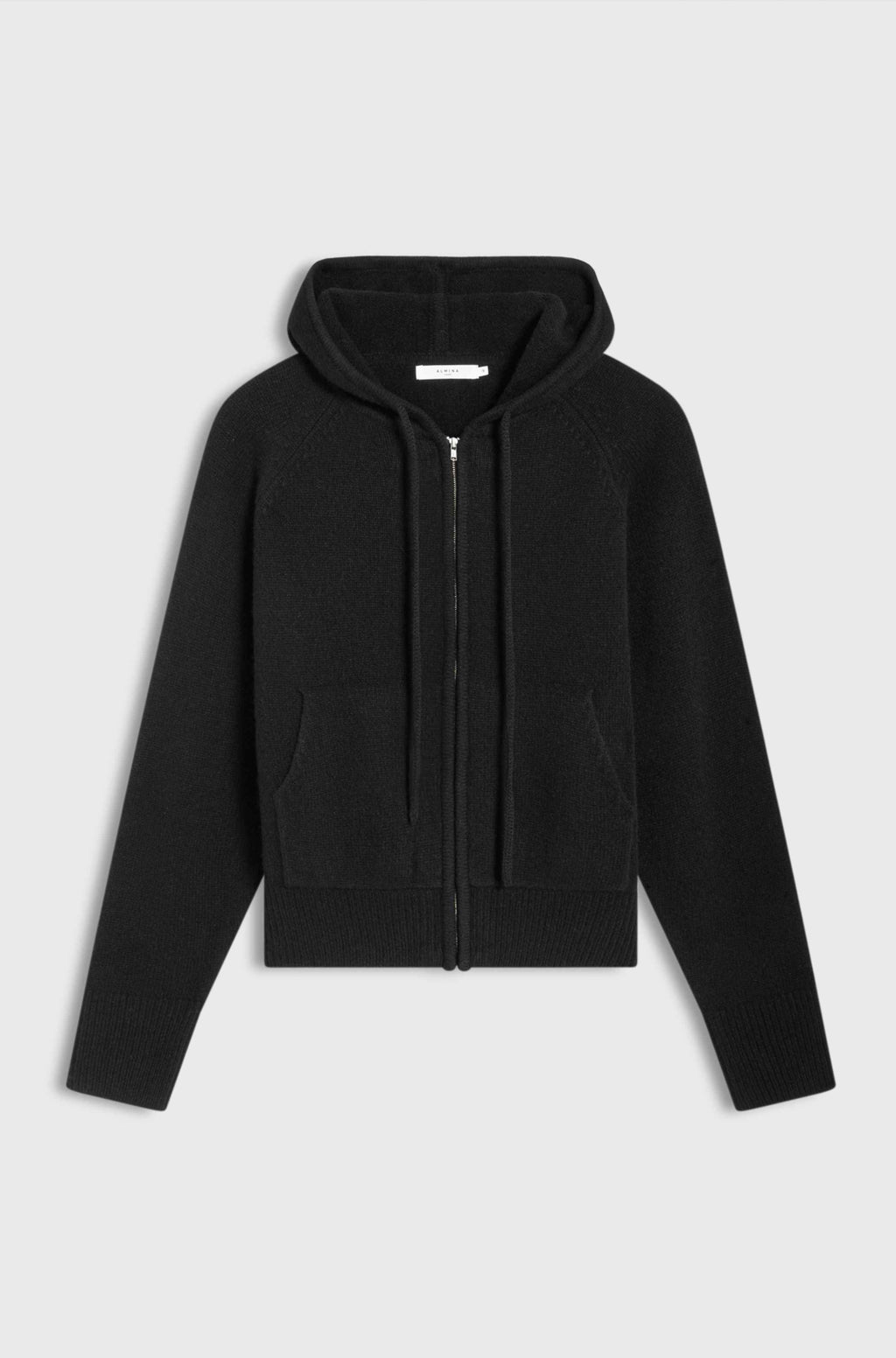 Black hoodie with a zipper on a light gray background