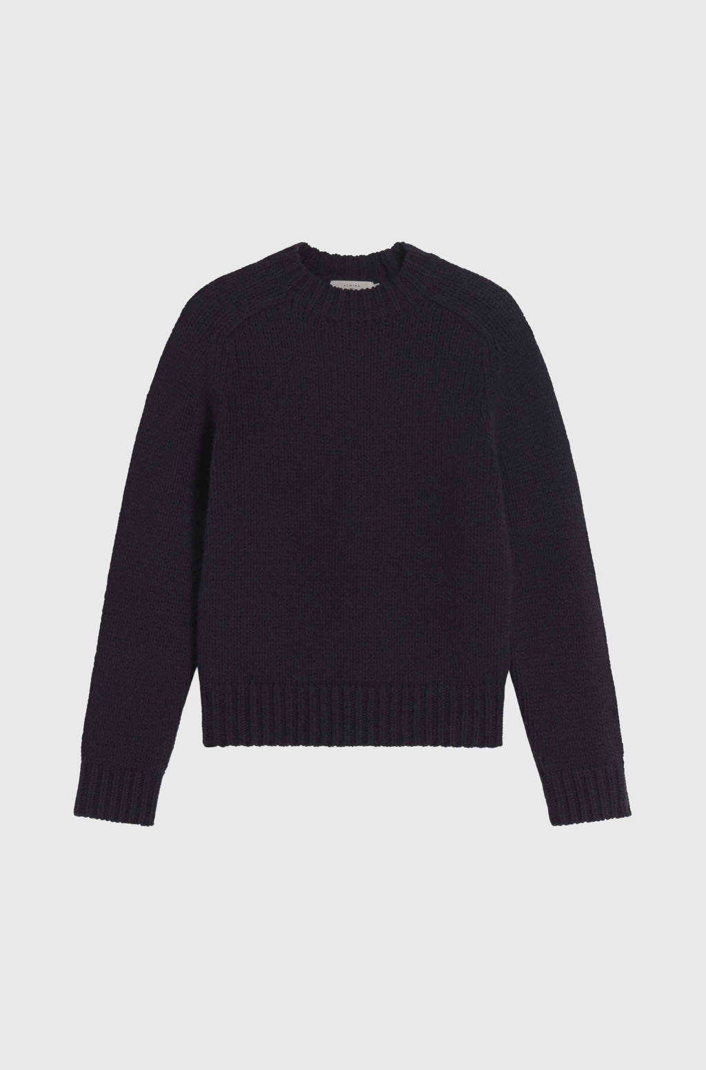 Dark blue sweater on a light gray background
