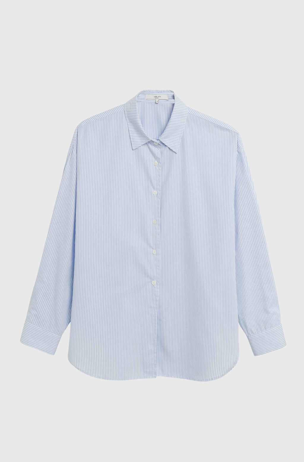 Light blue striped shirt on a light gray background