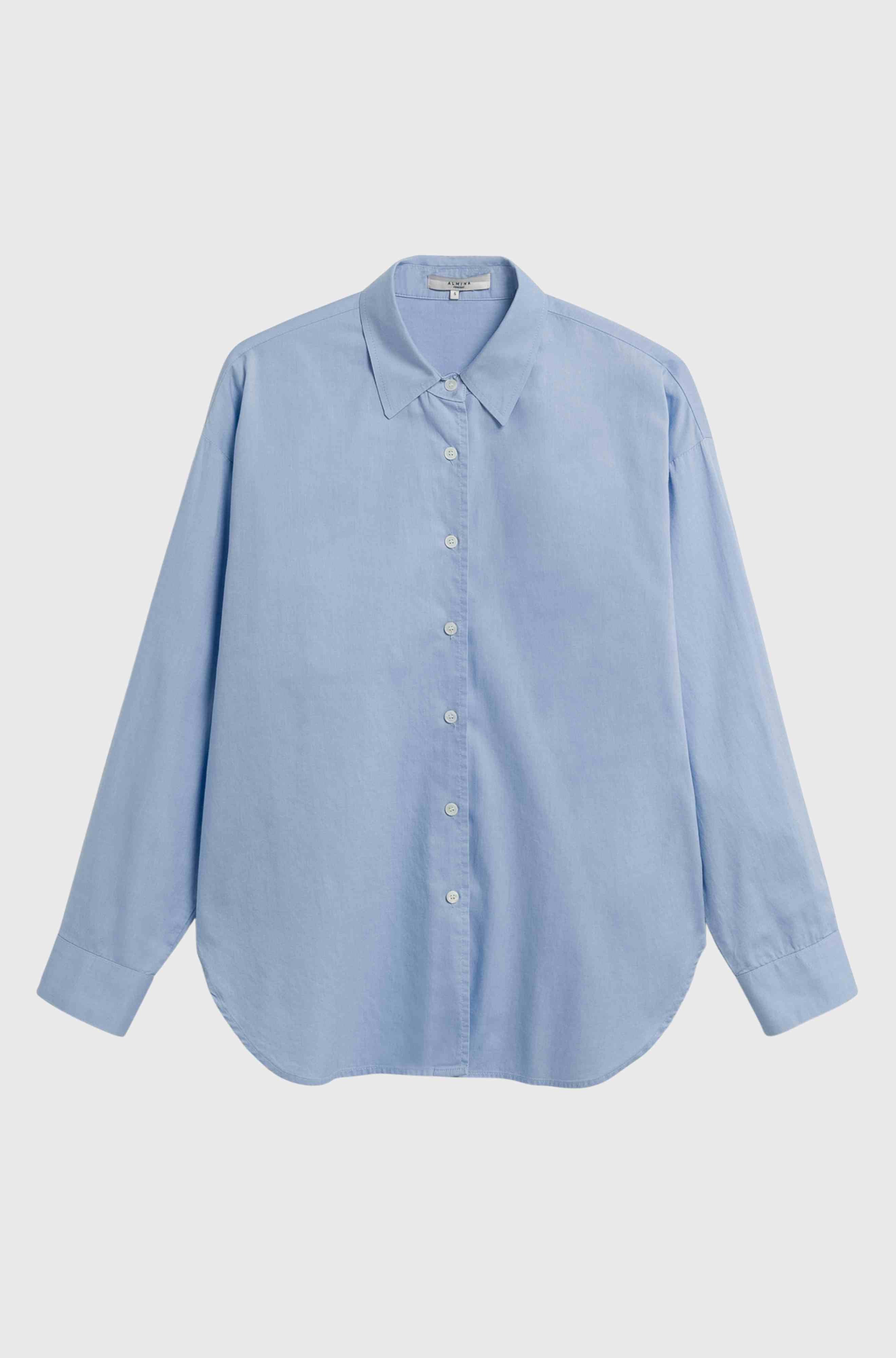 Light blue shirt on a light gray background