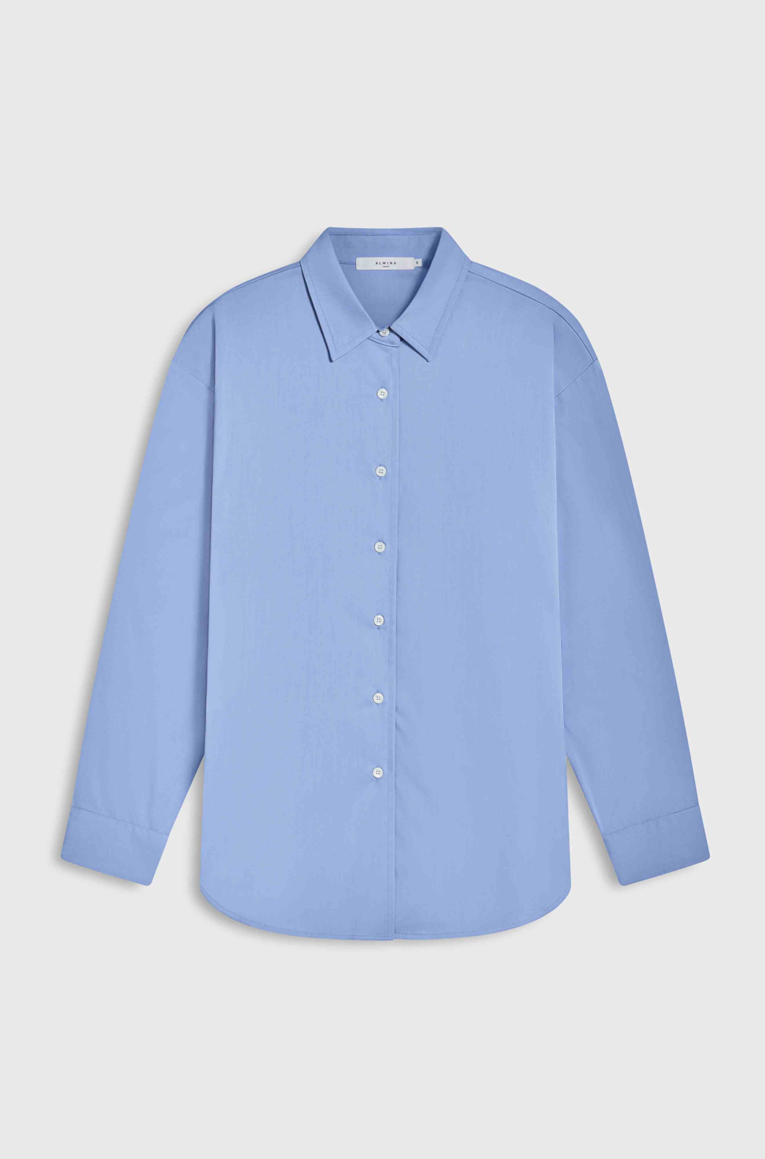 Light blue shirt on a light gray background
