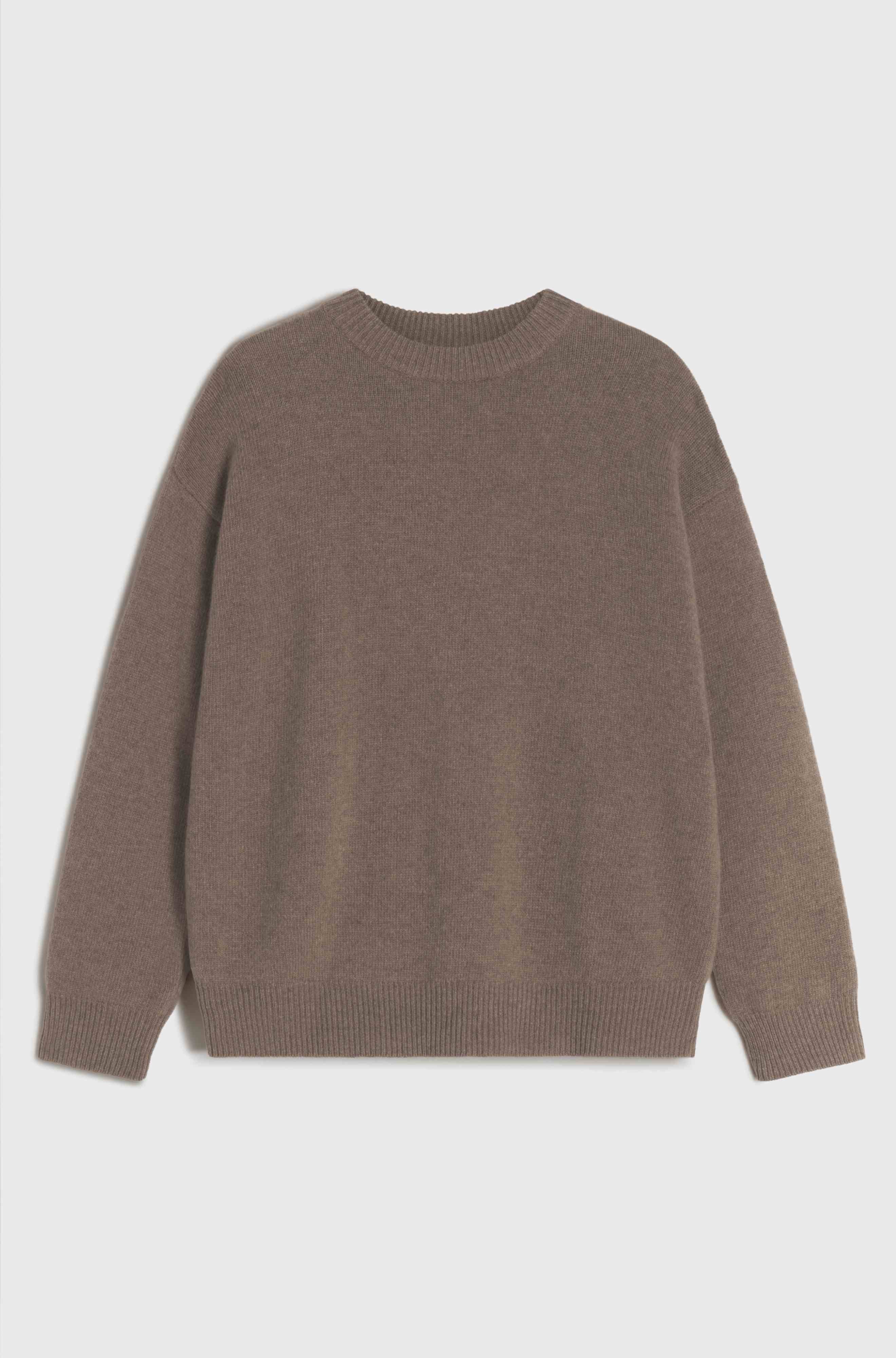 Brown sweater on a light gray background