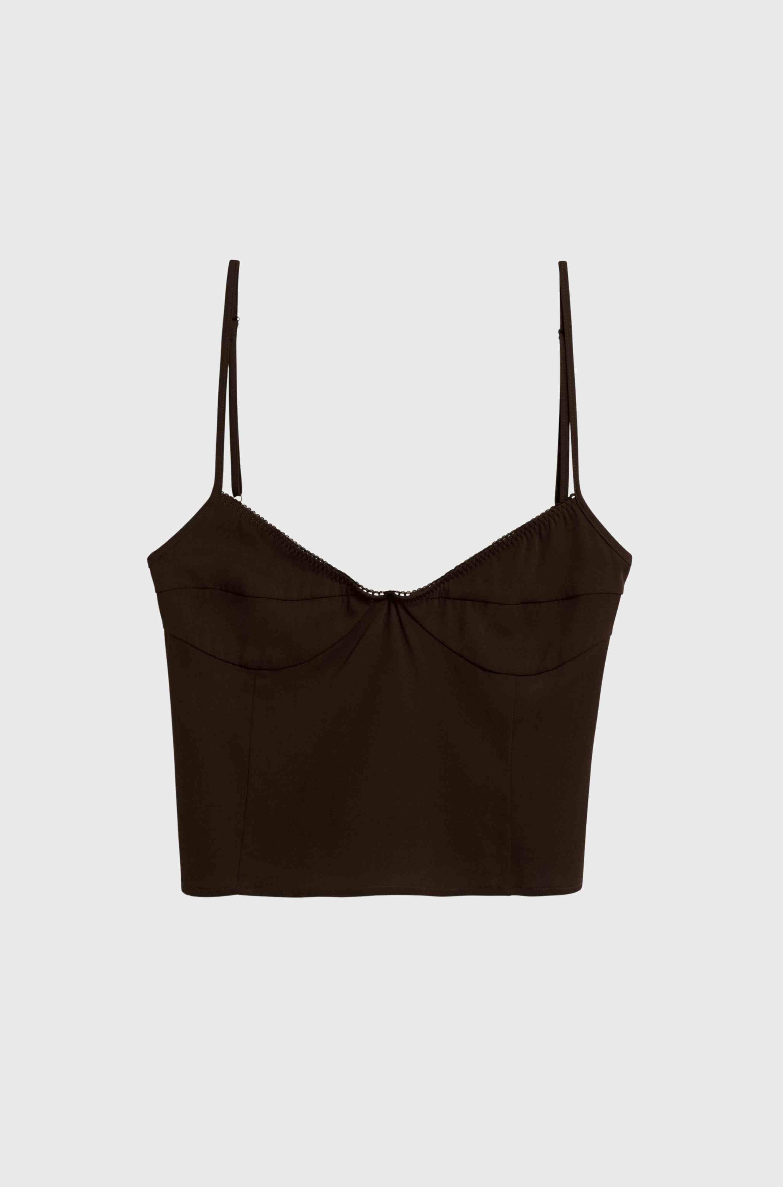 Dark brown silk top with thin straps on a light gray background