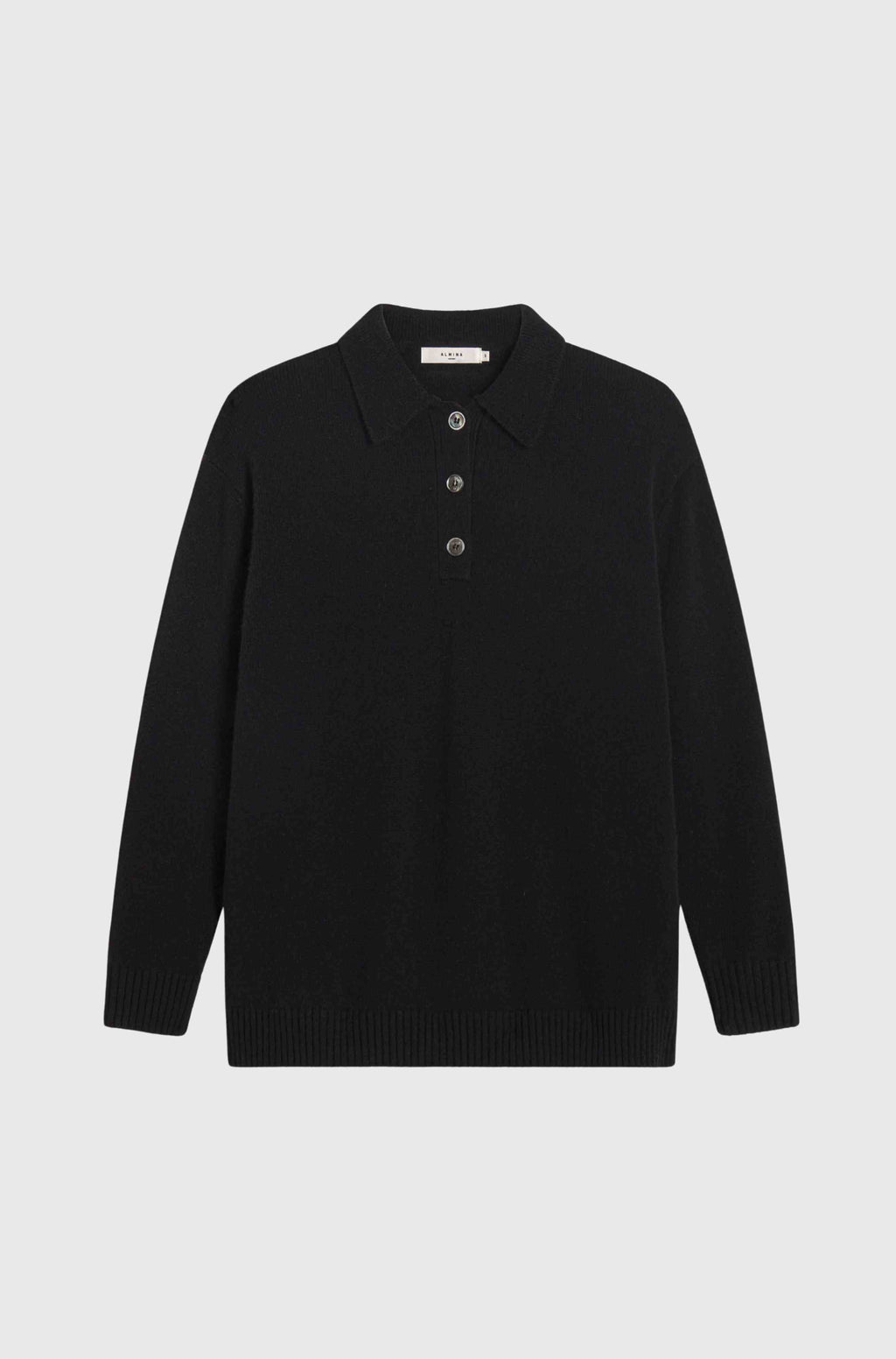 Black polo sweater with collar on a light gray background