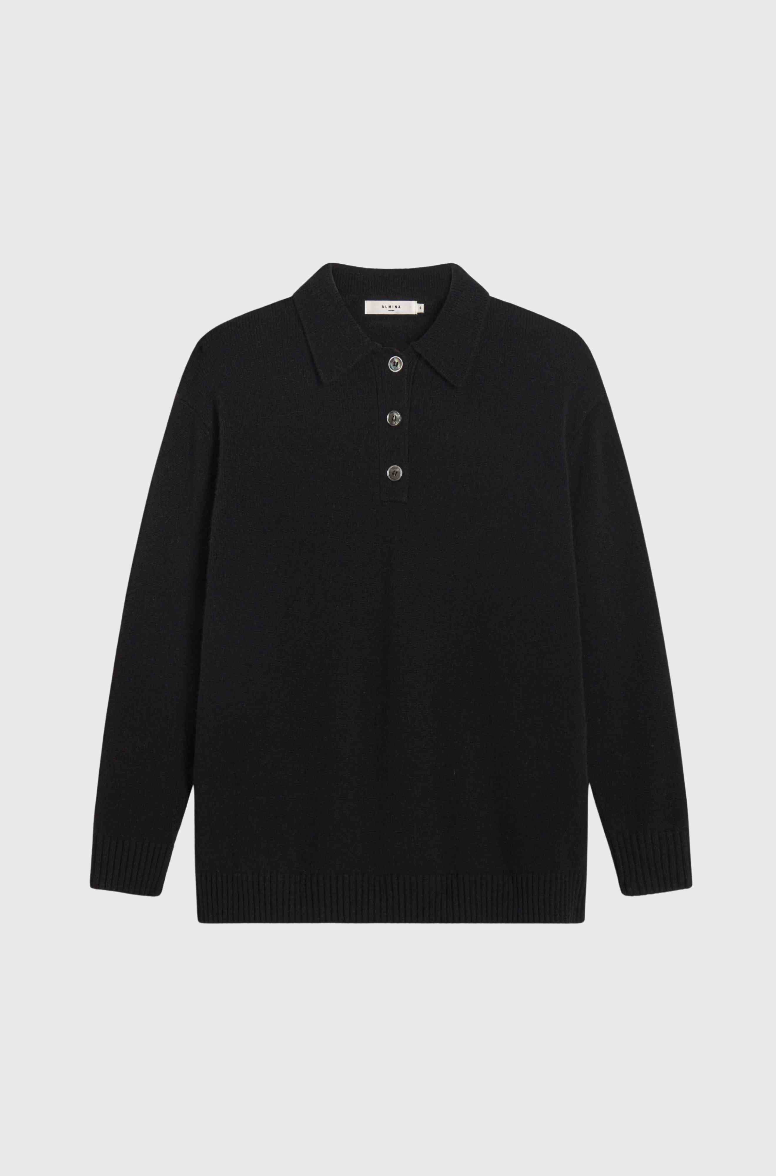 Black polo sweater with collar on a light gray background