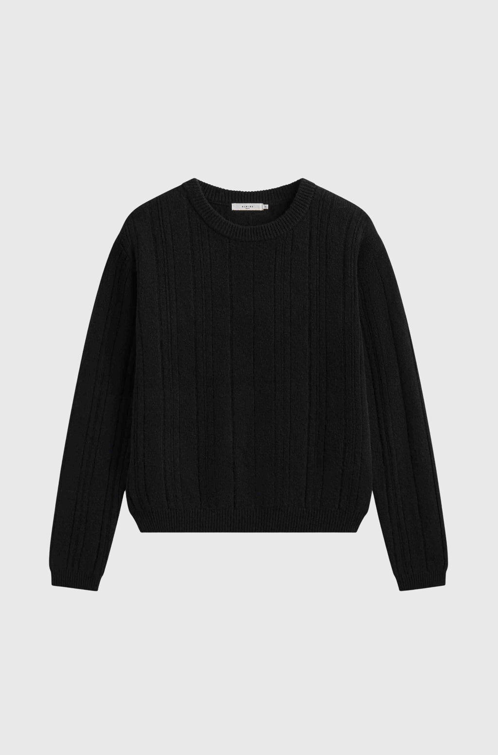 Black sweater on a light gray background