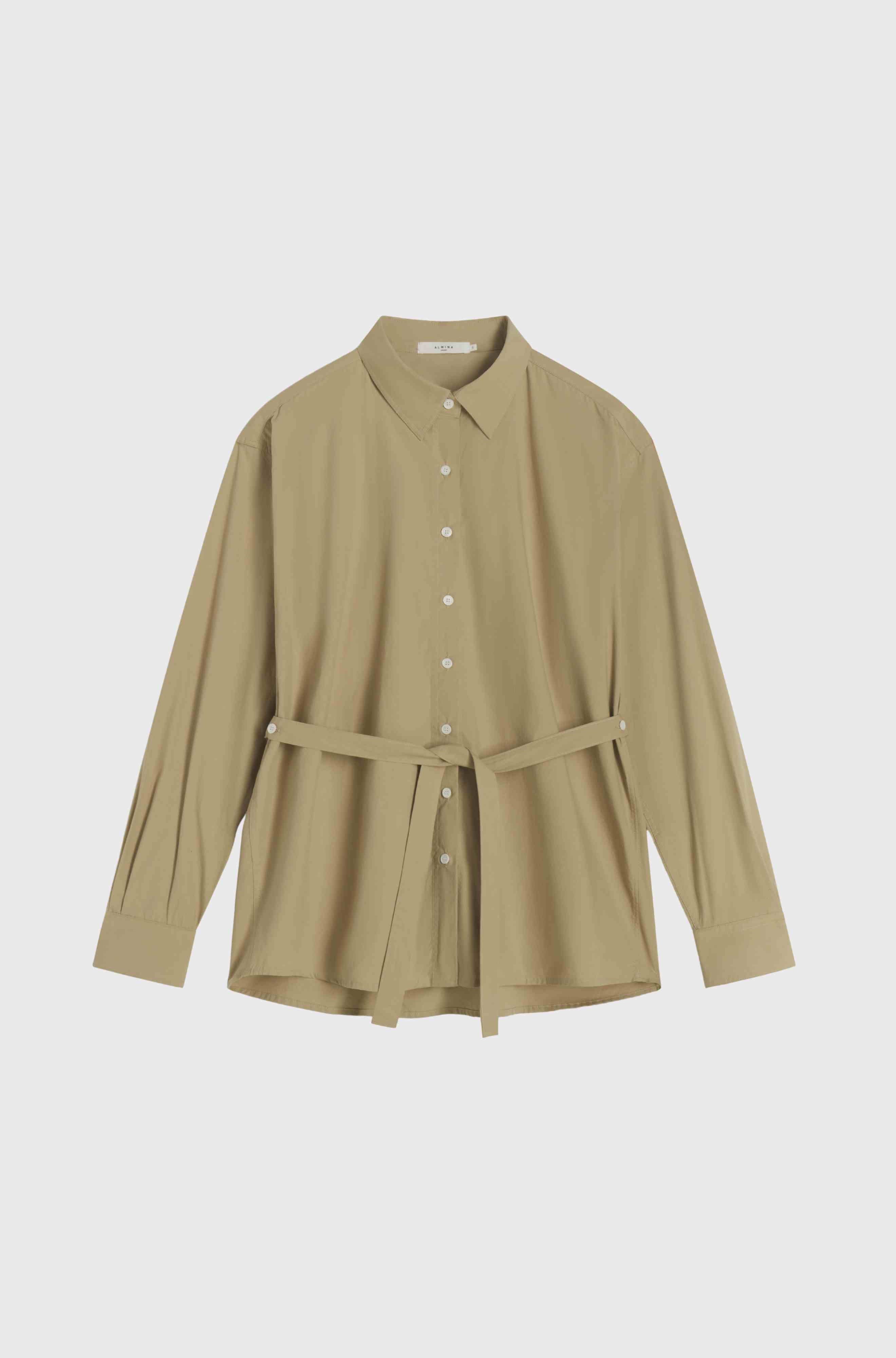 Beige shirt with a belt on a light gray background