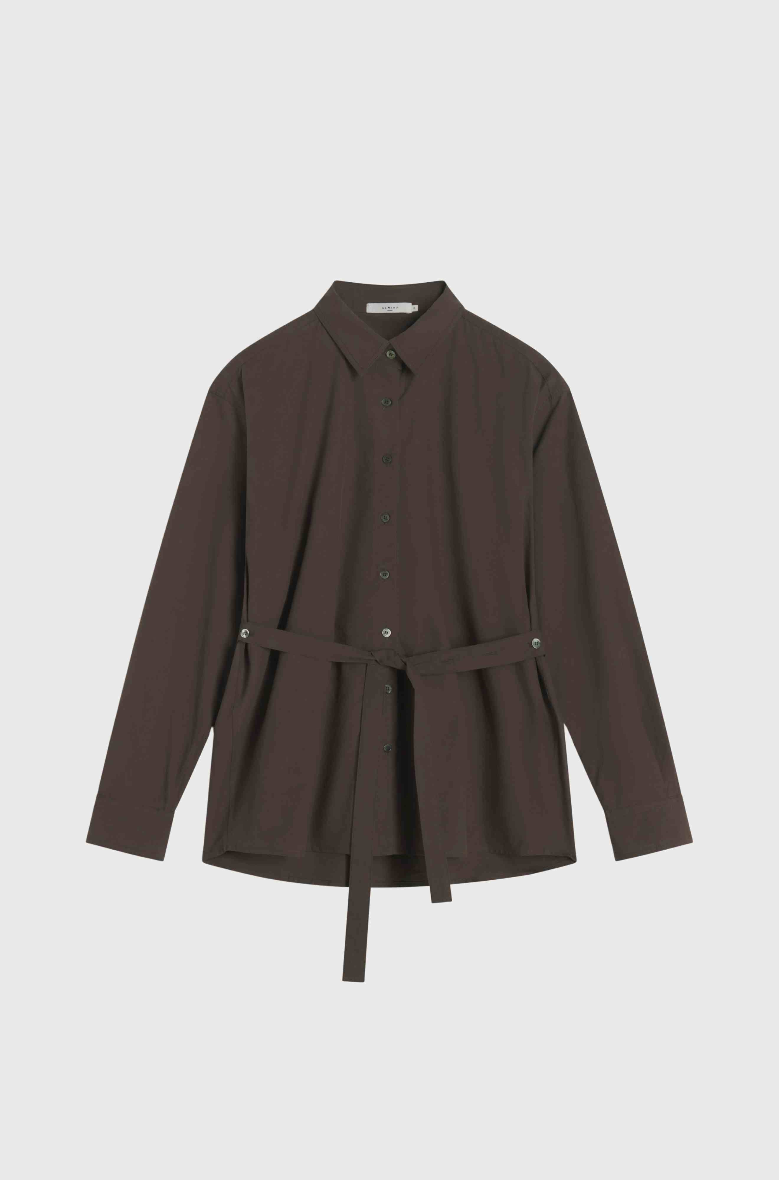 Brown shirt with a belt on a light gray background