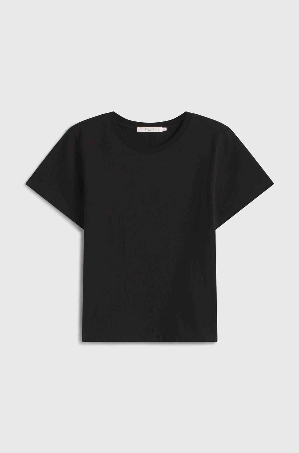 Black t-shirt on a light gray background