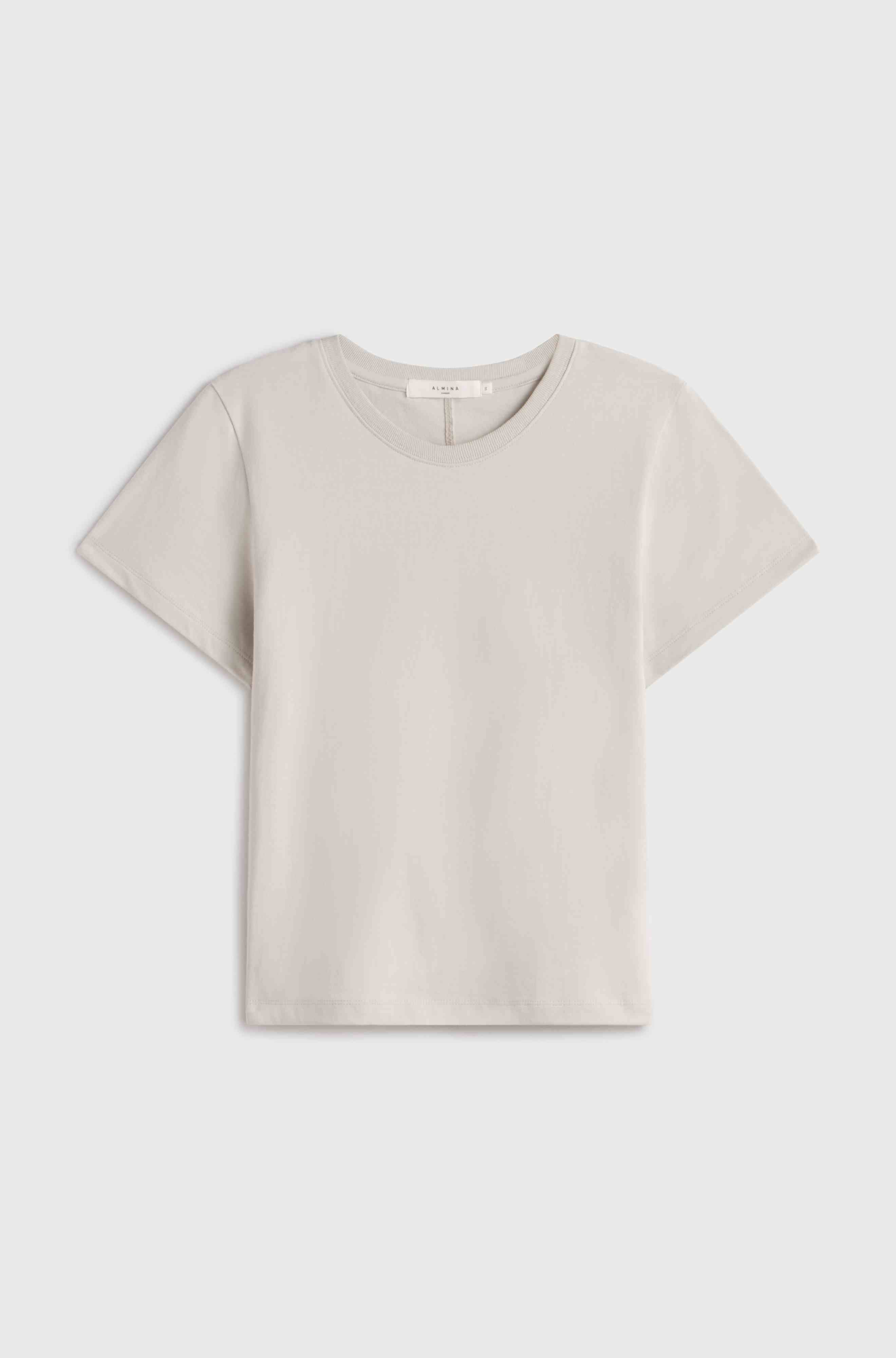 Light grey t-shirt on a light gray background