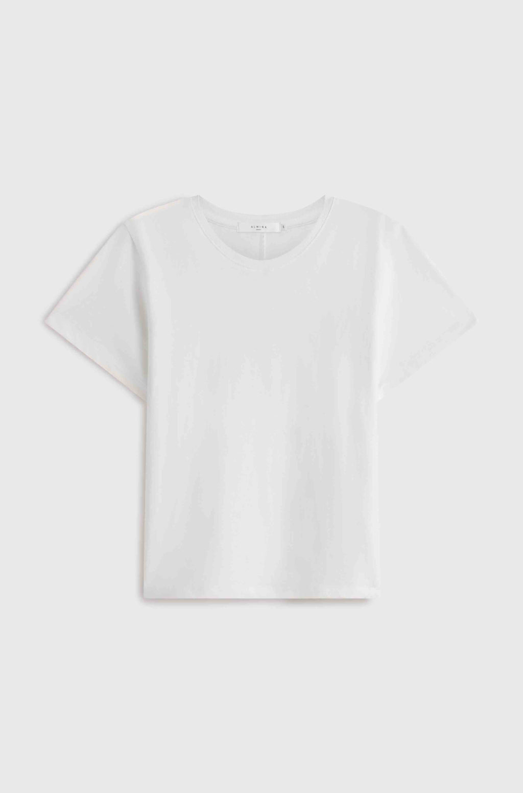 White t-shirt on a light gray background