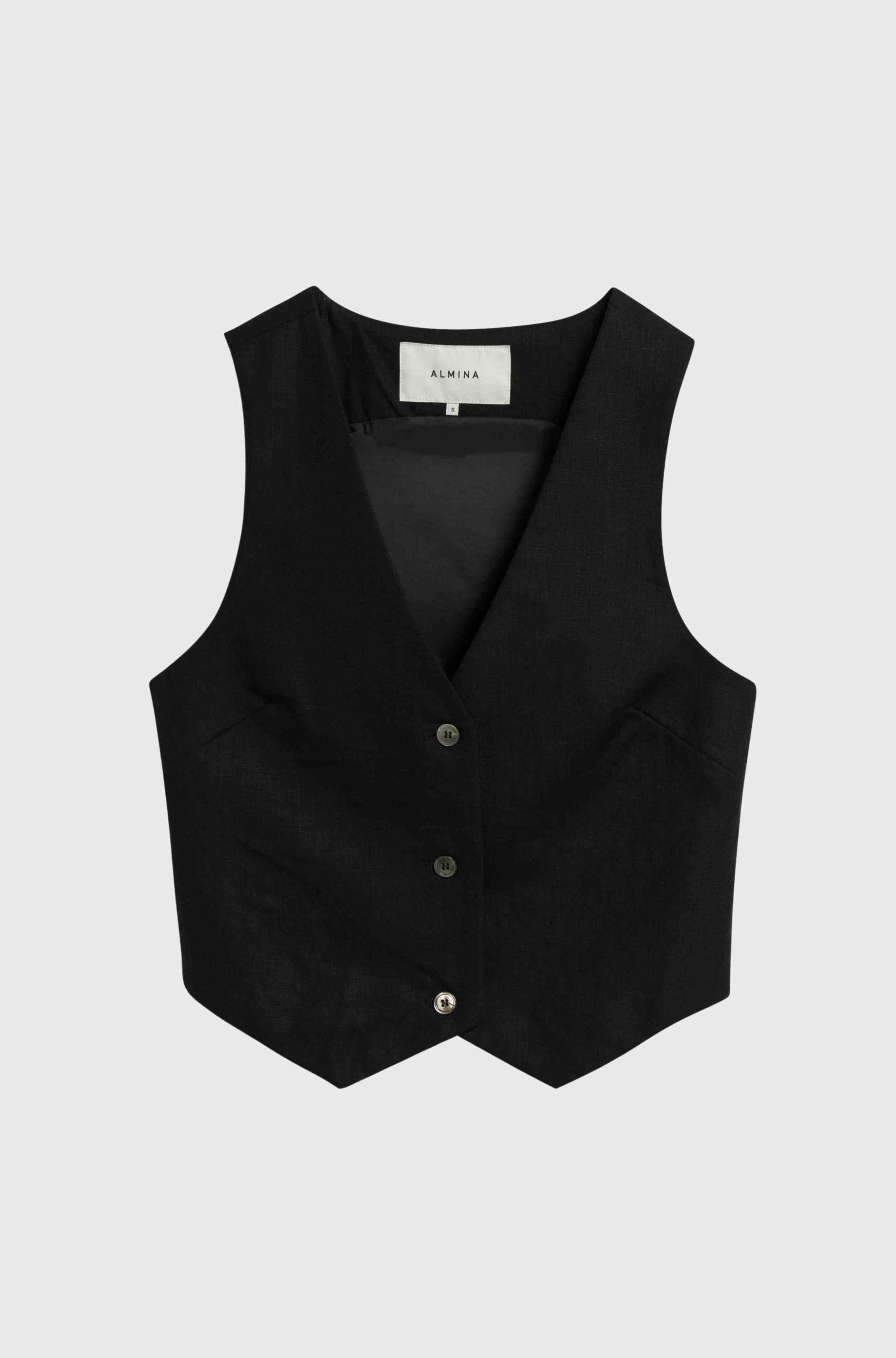 Black linen vest on a light grey background