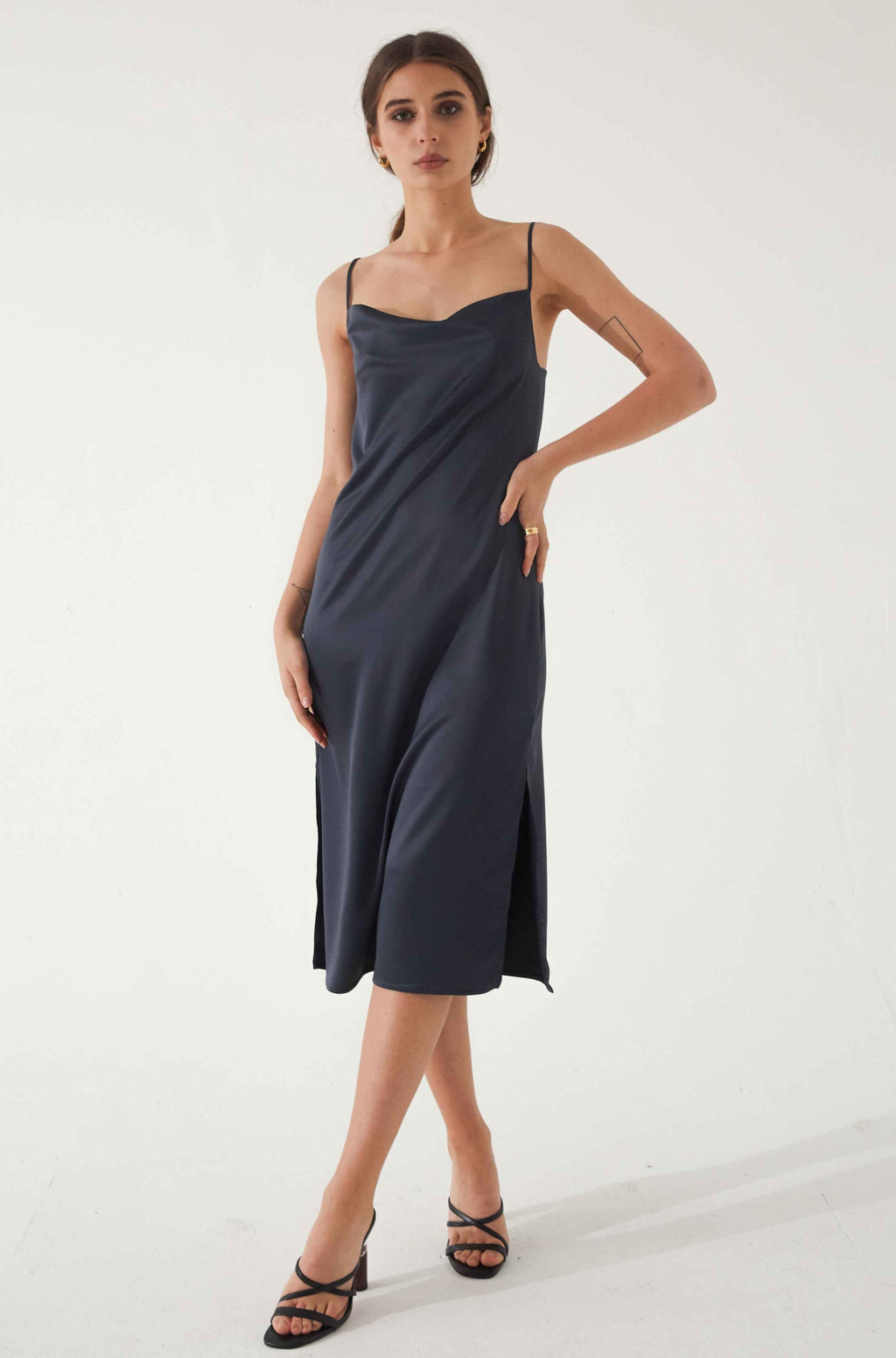 Woman wearing a blue silk dress