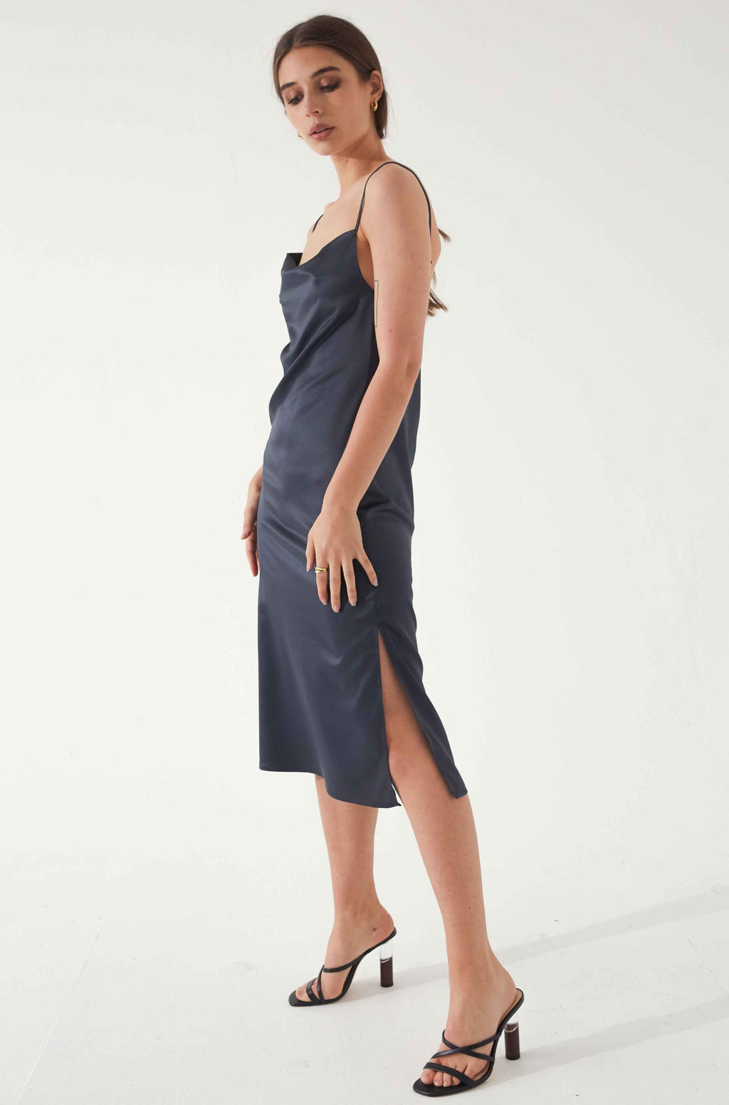 Woman wearing a blue silk dress