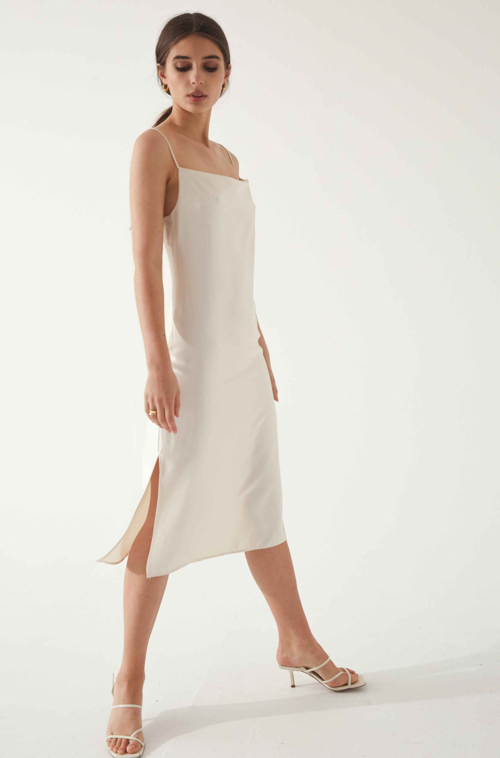 Woman wearing a white silk dress
