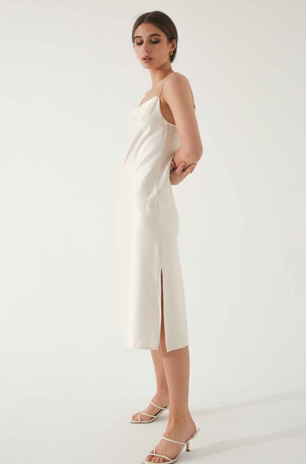 Woman wearing a white silk dress