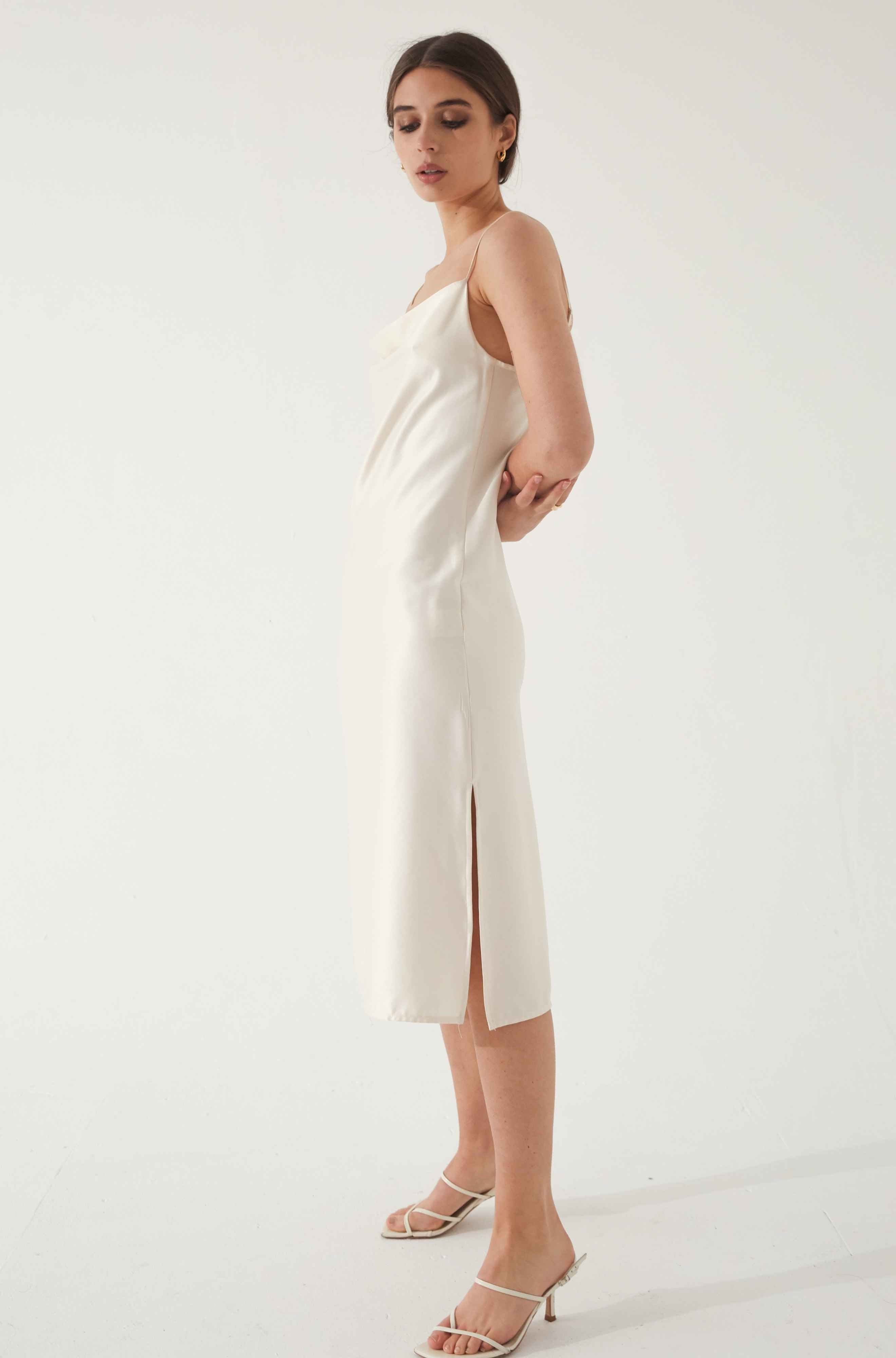 Woman wearing a white silk dress