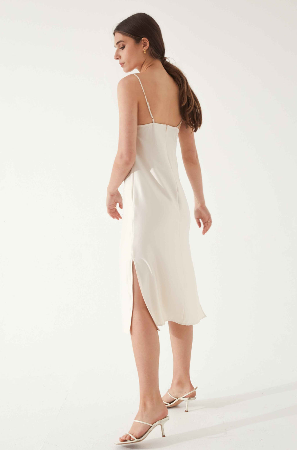 Woman wearing a white silk dress