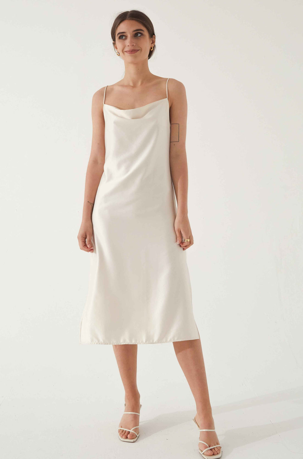 Woman wearing a white silk dress