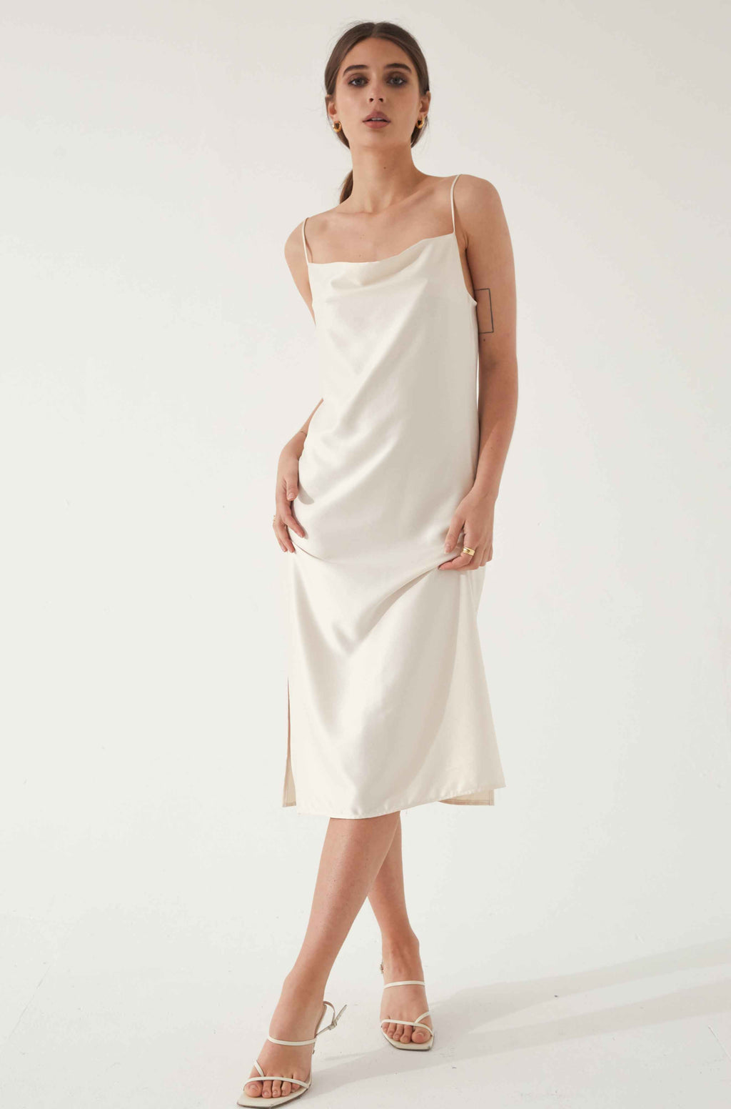 Woman wearing a white silk dress