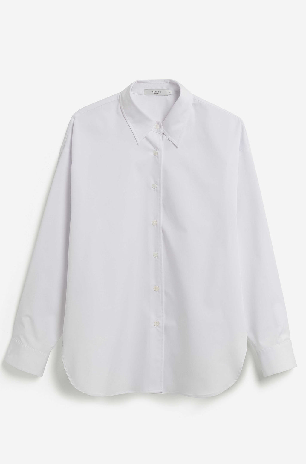 A white long-sleeve button-up shirt with a pointed collar, laid flat against a light off-white background.