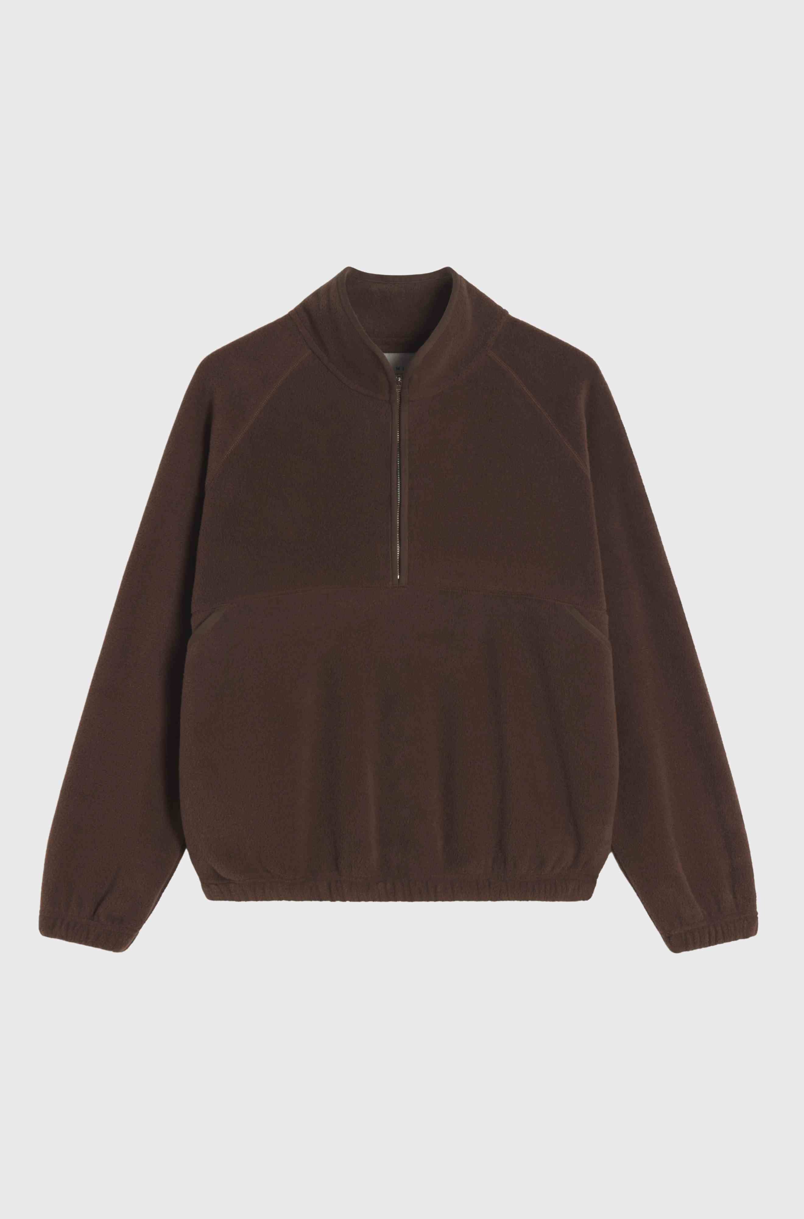 Brown fleece pullover on a light gray background